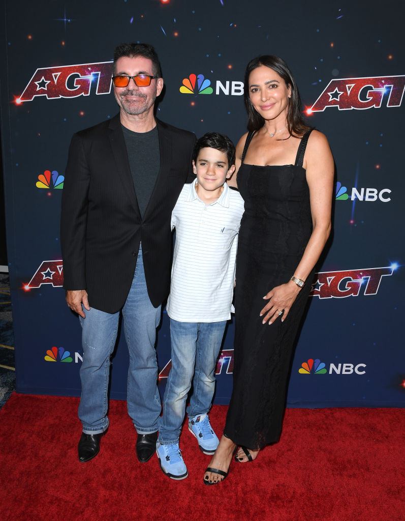 Simon Cowell with partner Lauren Silverman and son Eric. He credits Eric's birth in 2014 for “saving” him. Photo / Getty Images