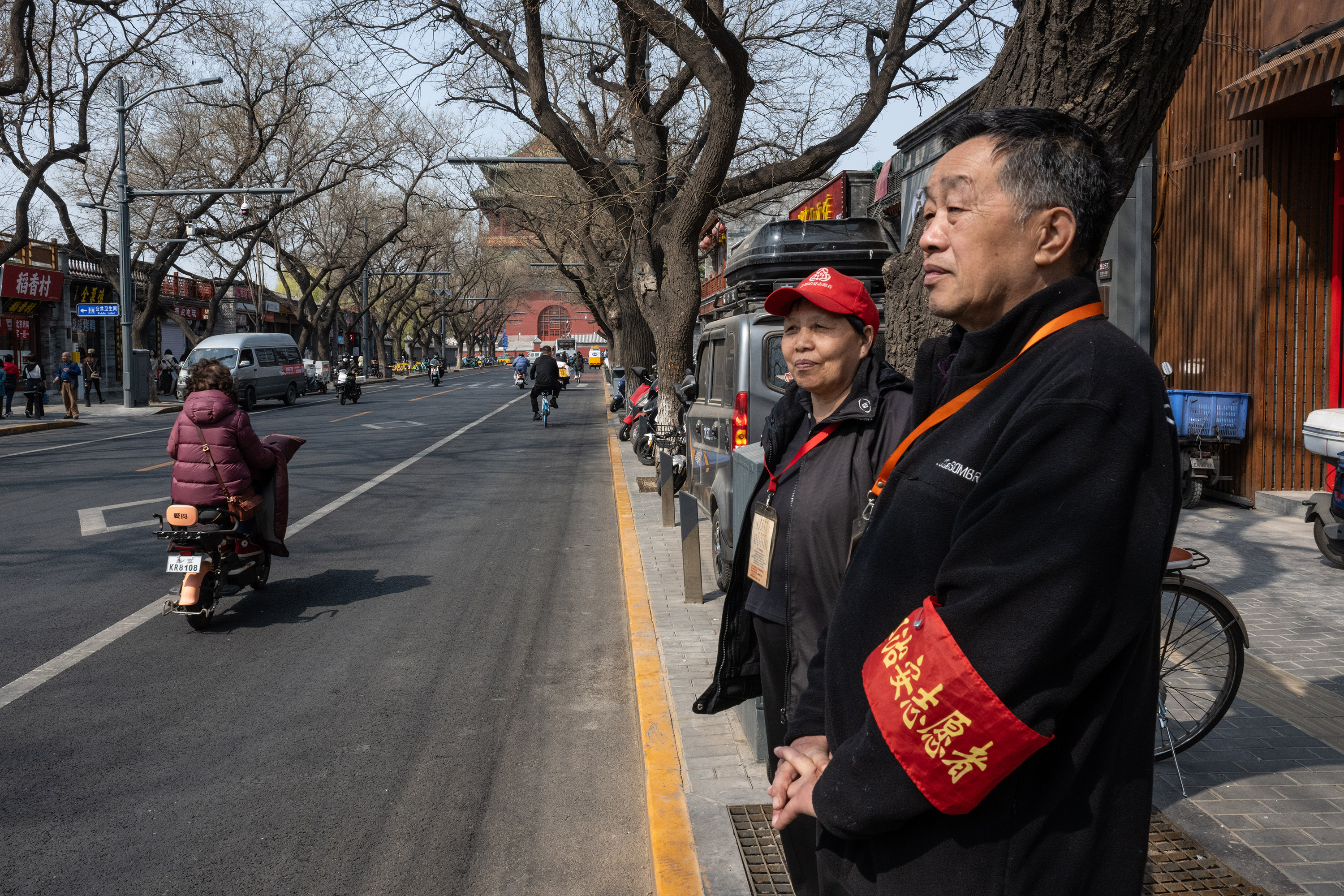 Volunteers from a neighbourhood committee keeping watch on a Beijing street in April. “Stability maintenance” - a catchall term for containing social problems and silencing dissent - has increasingly become a preoccupation in China under Xi Jinping. Photo / Gilles Sabrié, The New York Times