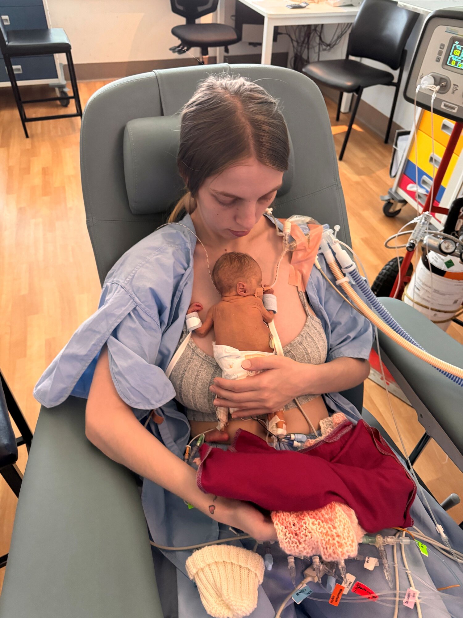 Octaviah Jackson and her daughter Sophie Neho pictured having their second cuddle together after Sophie was born extremely premature. 
