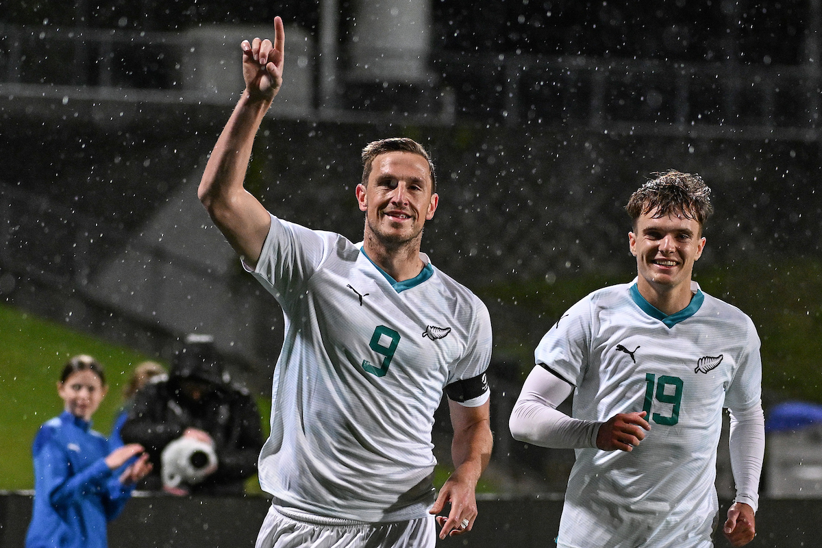 Chris Wood celebrates his goal against Malaysia with Ben Old. Photo / Photosport