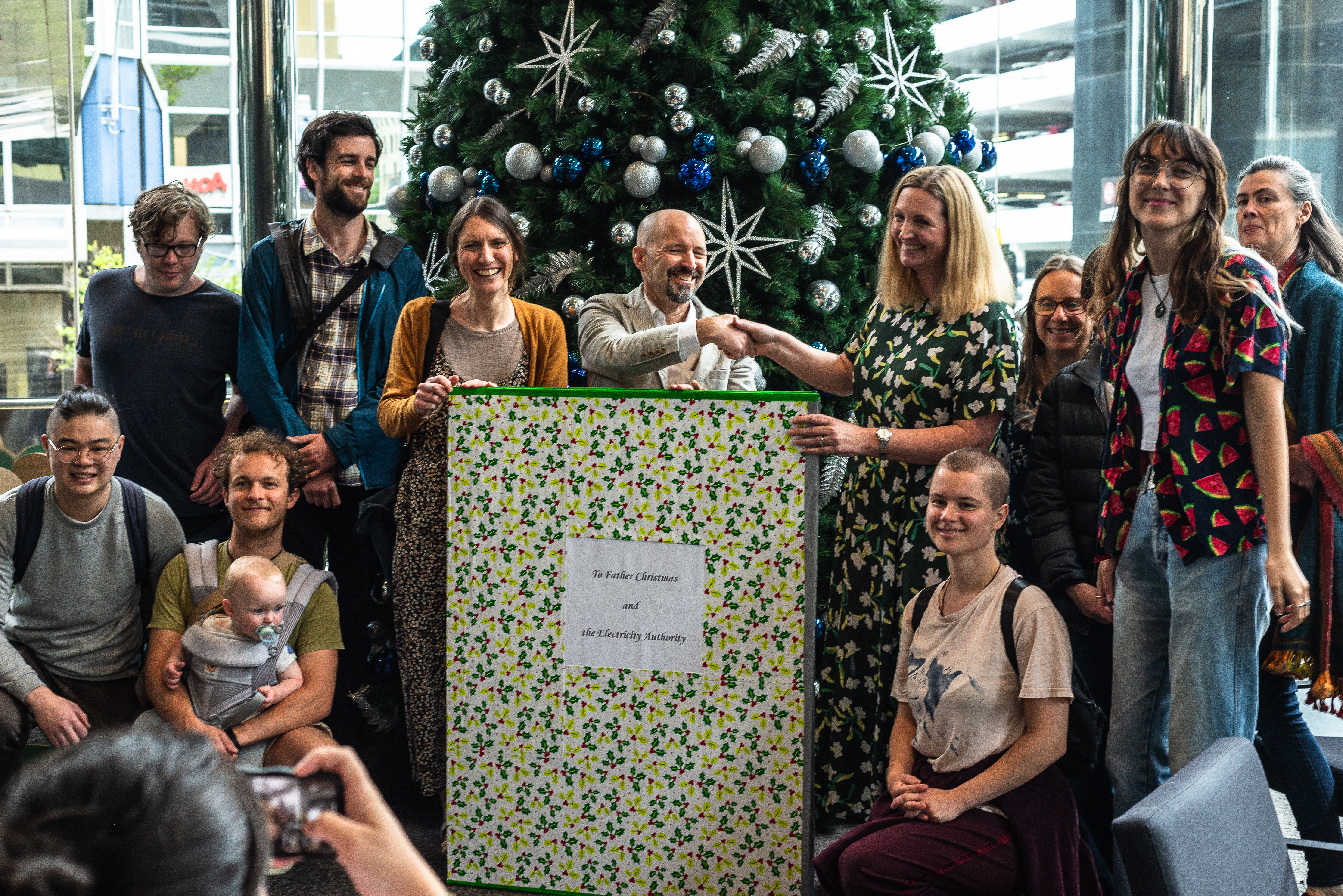 At Christmas, the team at Everyone Connected presented Electricity Authority chief executive Sarah Gillies with a card asking for mandatory consumer protections in dealing with power companies.