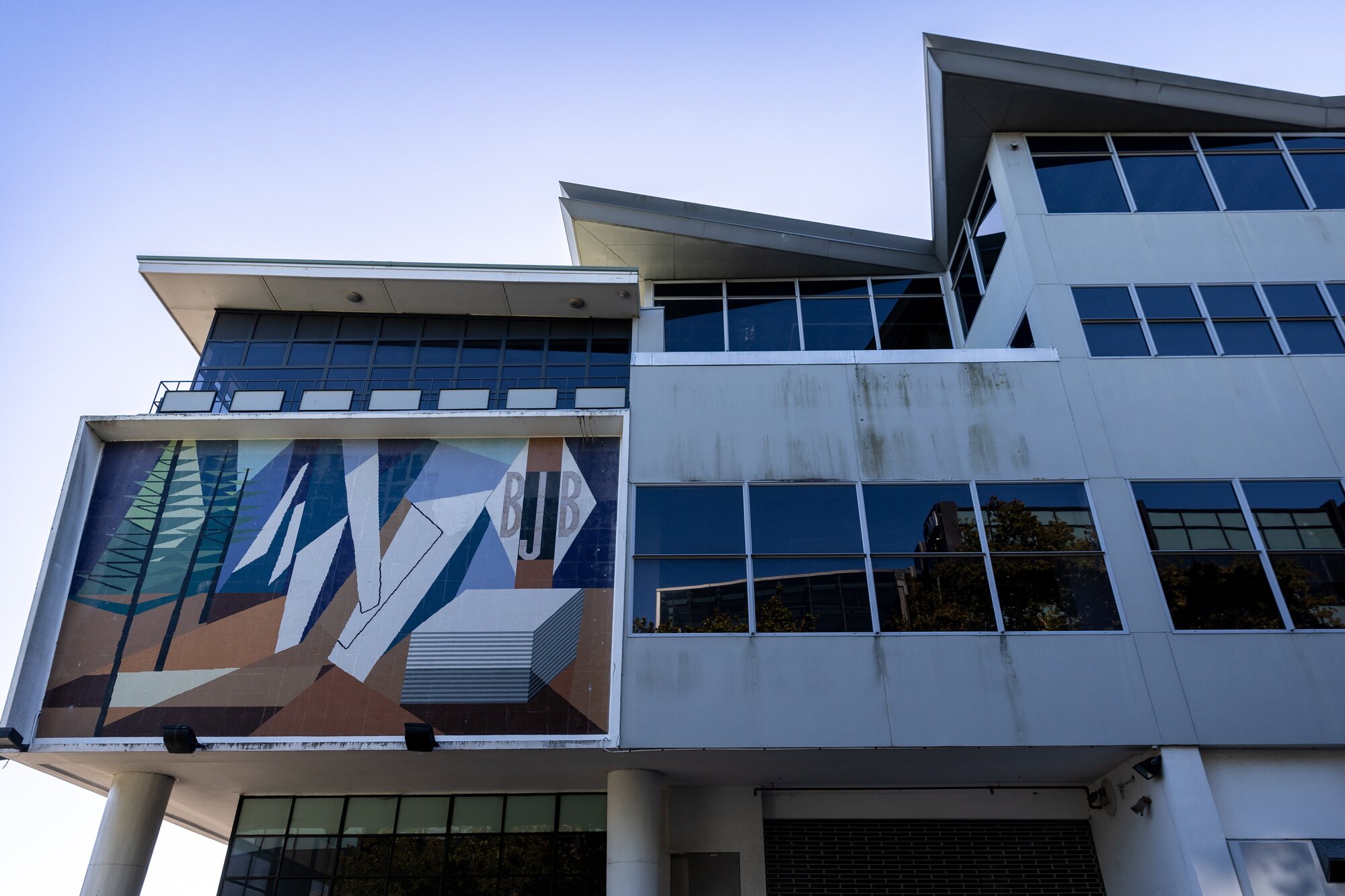 The Milan Mrkusich mural, 35 Graham St, where new offices are rising. Photo / Michael Craig