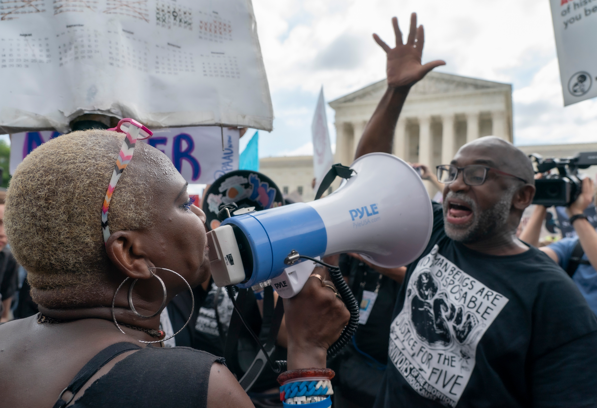 Abortion-rights and anti-abortion protesters face off in front of the US Supreme Court. Photo / AP