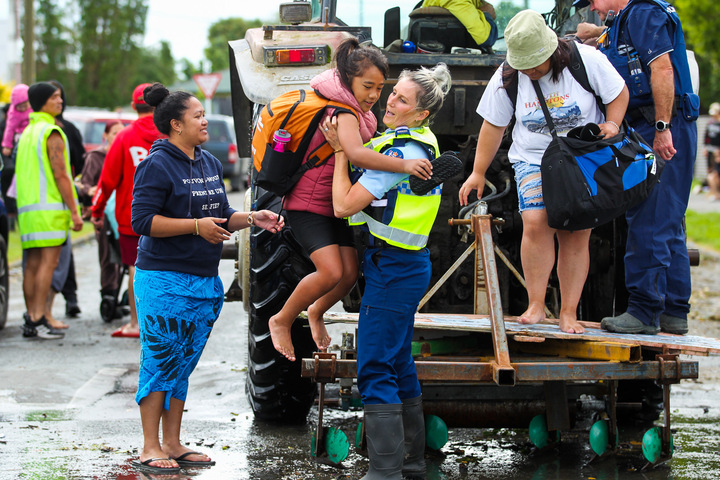 Police help with evacuations at Venables Ave in Maraenui, Napier. Photo / Paul Taylor