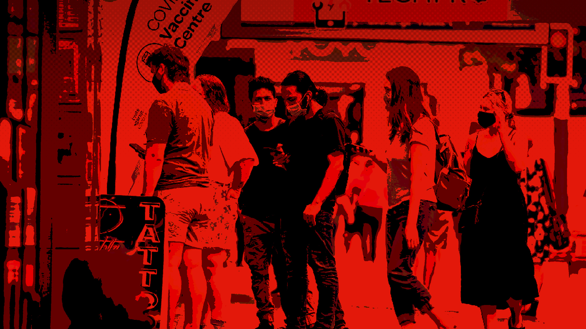 People wear masks on Queen St, Auckland.