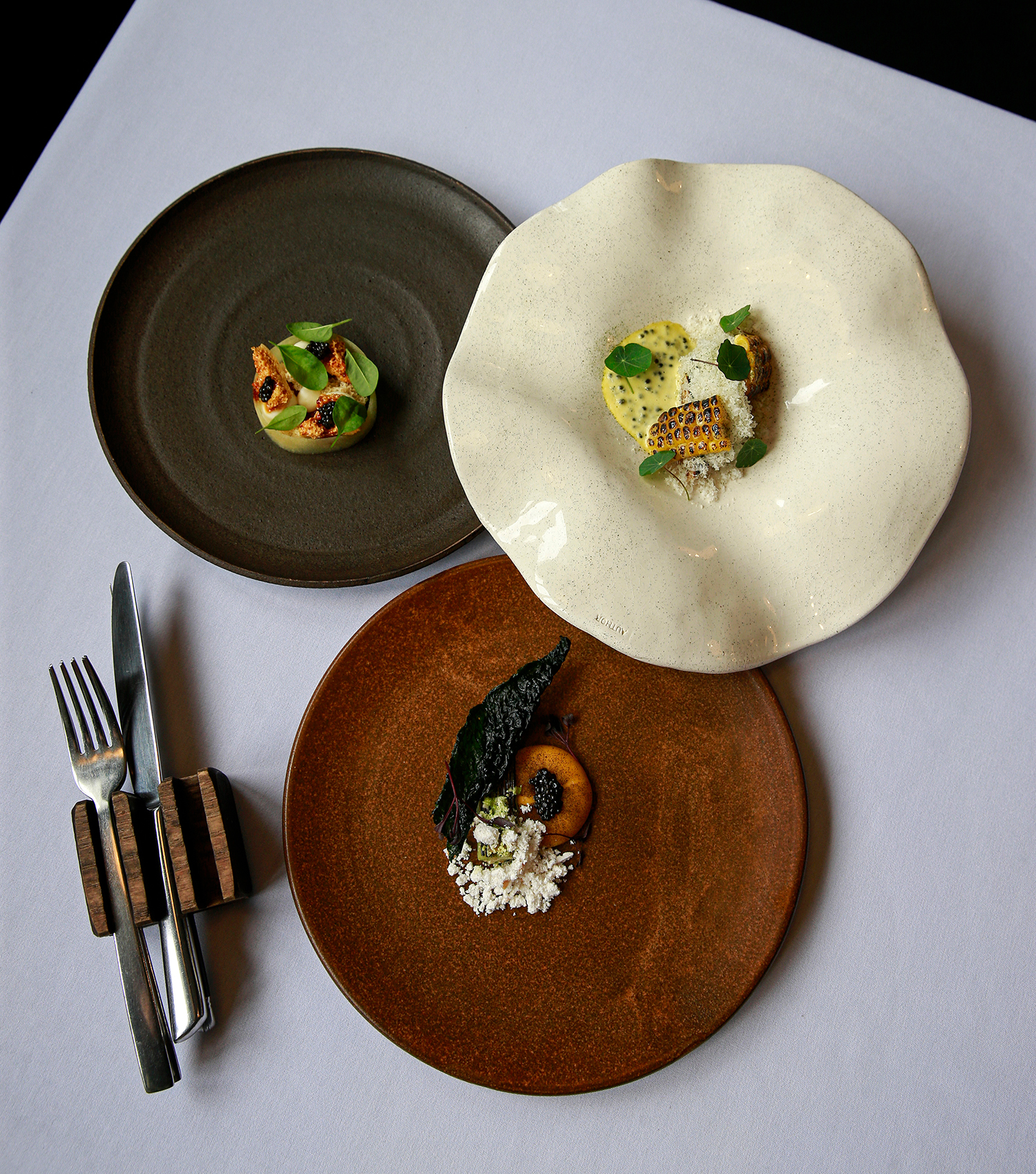 A selection of caviar-topped plates from fine-dining restaurant Sidart. Photo / Alex Burton