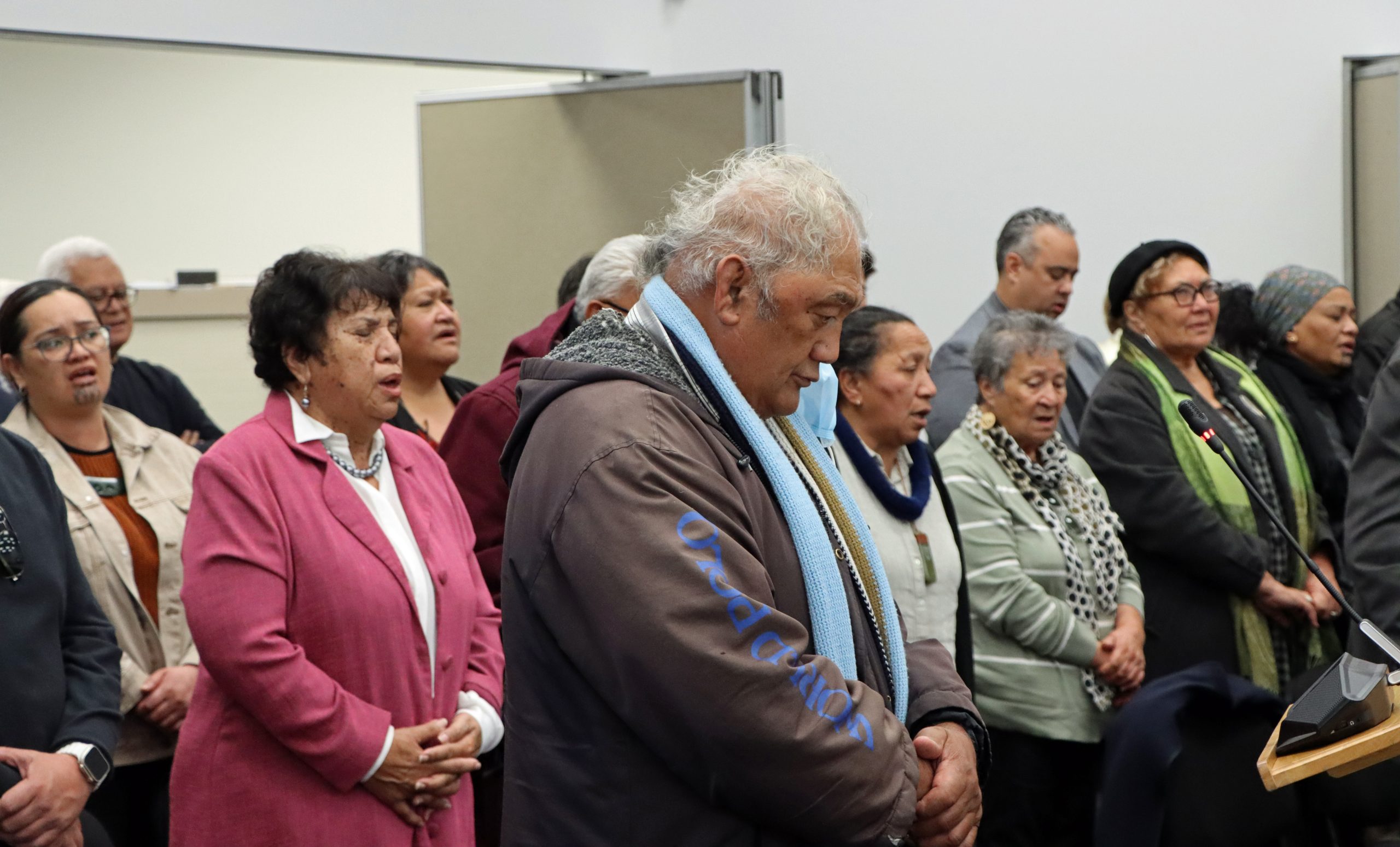 People in the public gallery sang waiata when the decision was made to adopt a Māori ward in the Western Bay of Plenty. Photo / Alisha Evans
