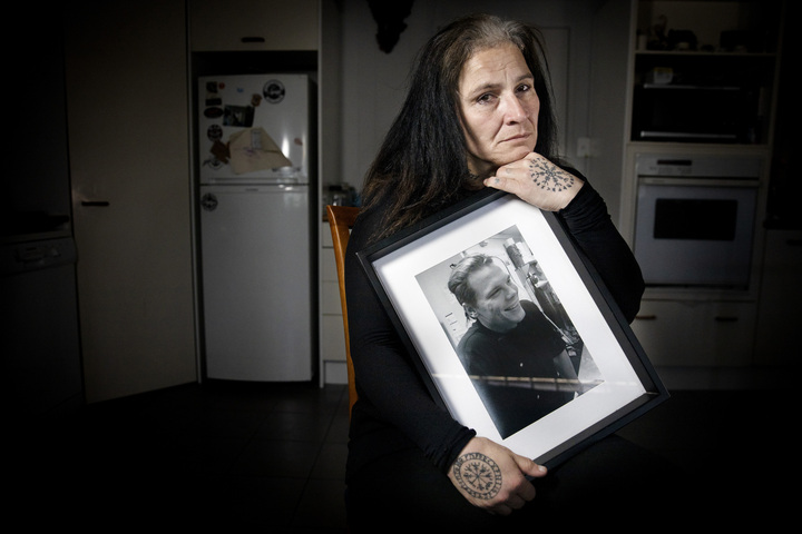 Dannette Vrijs holds a photo of her son, Robert Nelson, the only memory she has after he was shot and killed during a gang shooting in Melville in 2018. Police say he was in the wrong place at the wrong time. Photo / Mike Scott