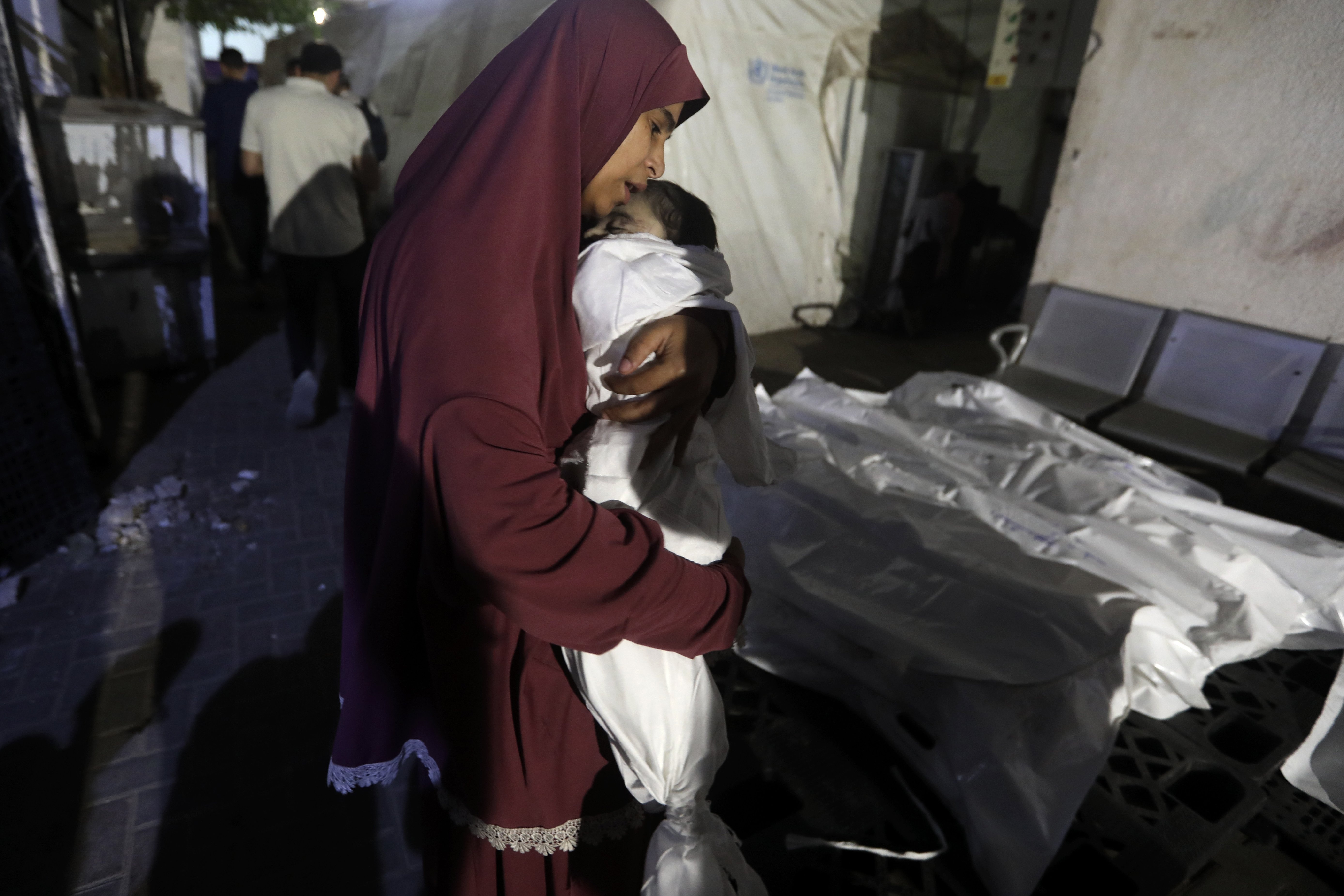 A Palestinian woman mourns her relative, 7-month old baby Hani Qeshta, who was killed in an Israeli bombardment on a residential building in Rafah. Photo / AP