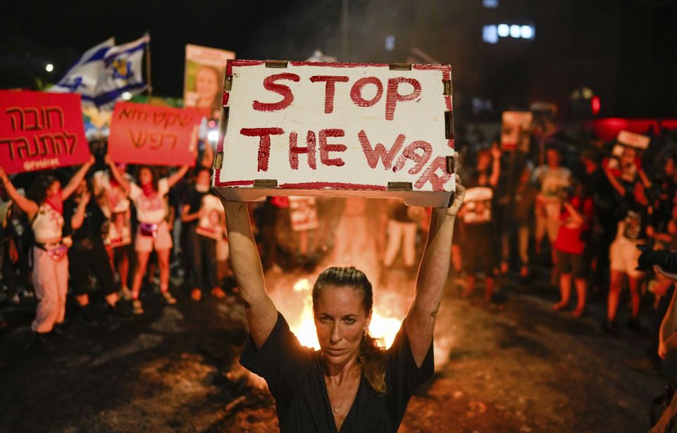 People protest against Israeli Prime Minister Benjamin Netanyahu's government and call for the release of hostages held in the Gaza Strip by the Hamas militant group, in Tel Aviv, Israel. Photo / AP