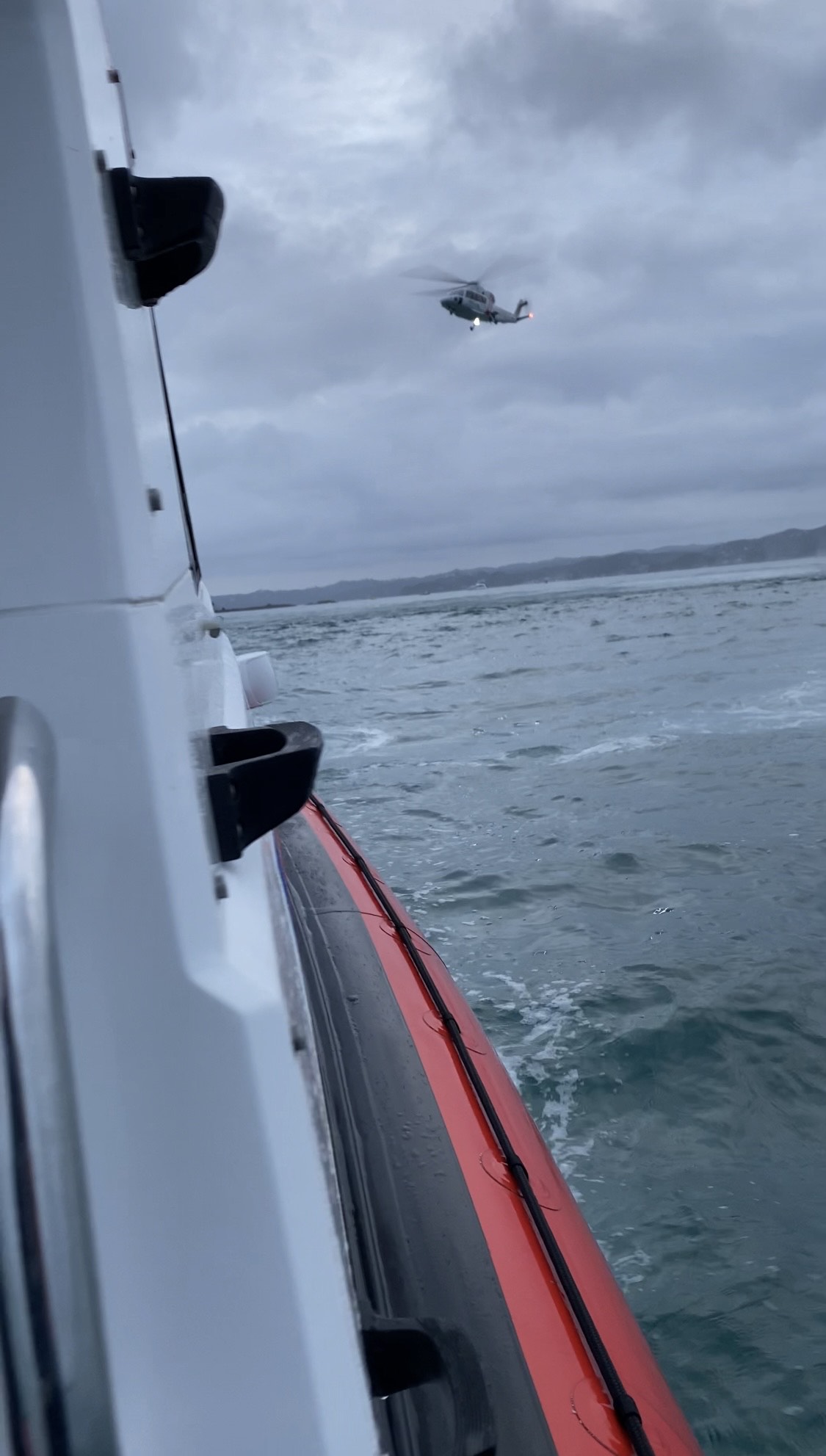 A helicopter was brought in to help search for a diver missing at Waihihi Bay in the Far North.