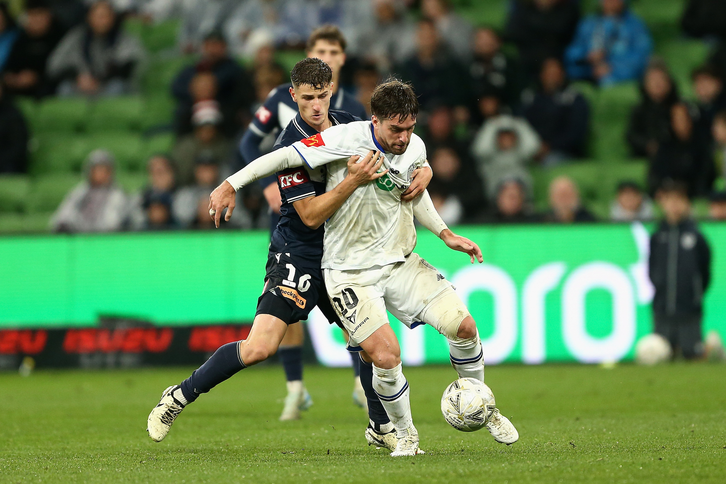 Auckland FC's Guillermo May controls the ball under pressure from a Melbourne Victory player. Photo / Photosport