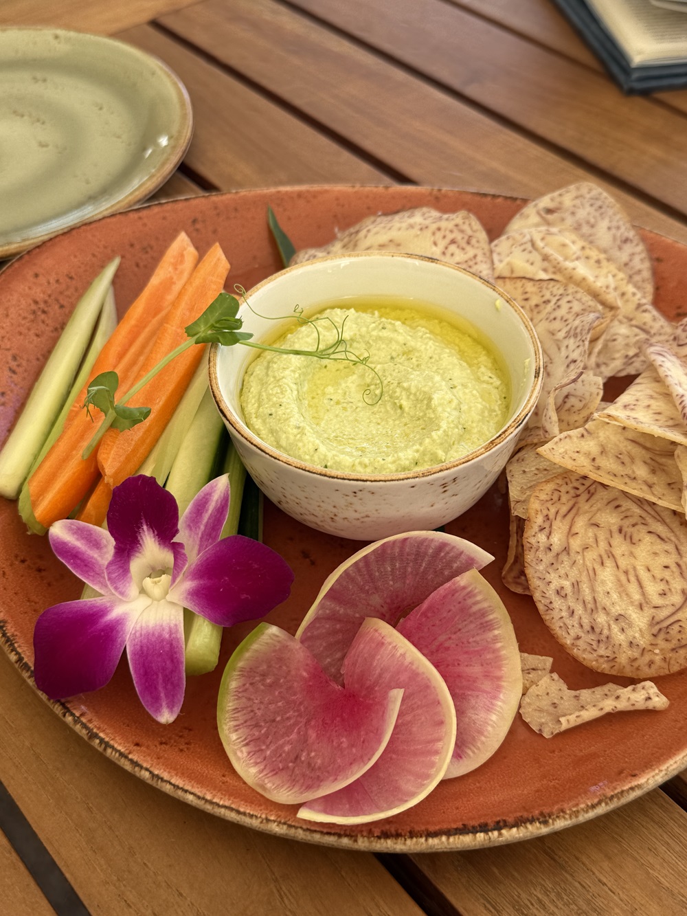 Sampling the local fare is another highlight in Hawaii with its Japanese influences, like this edamame hummus dip served with tahini, taro chips and seasonal vegetables. Photo / Marissa Findlay