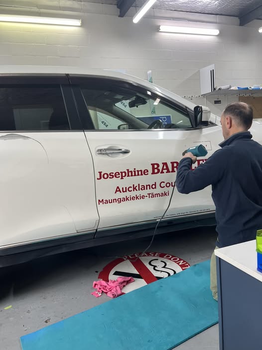 Auckland councillor Josephine Bartley has stripped signage from her vehicle citing safety fears.