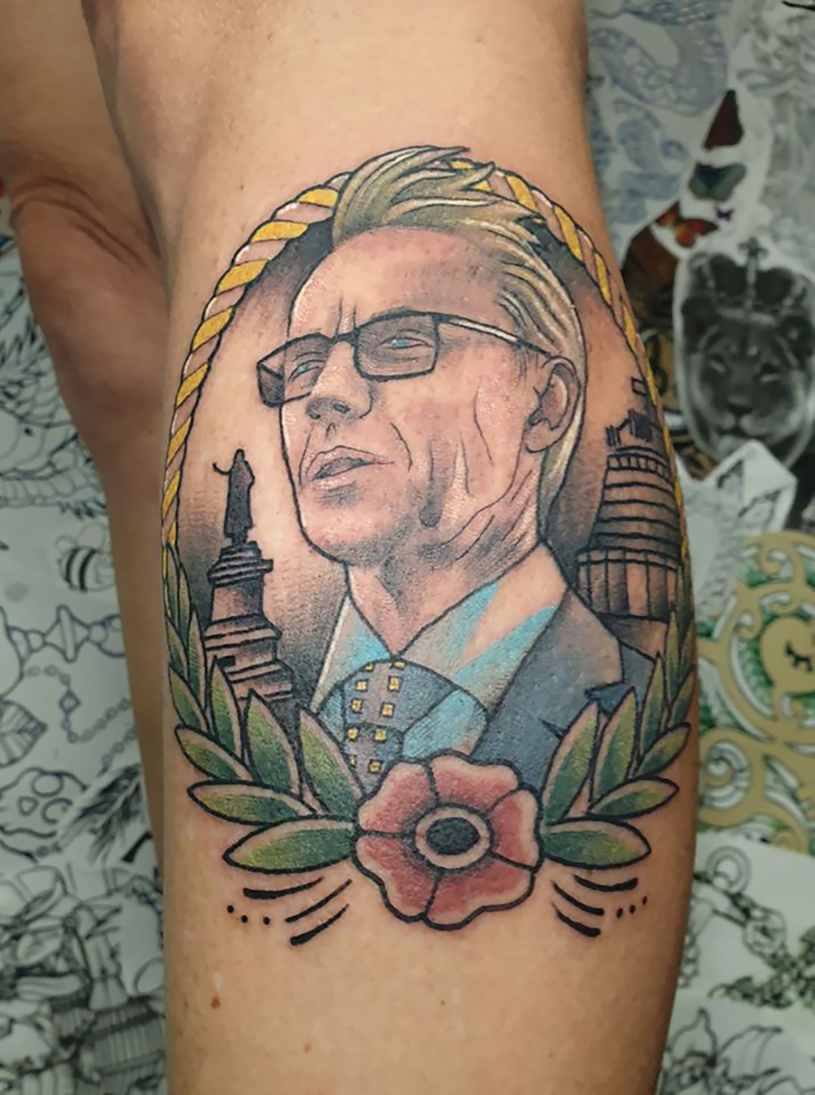 A Kiwi woman paid tribute to Sir Ashley Bloomfield by having a tattoo of him inked on her calf. 