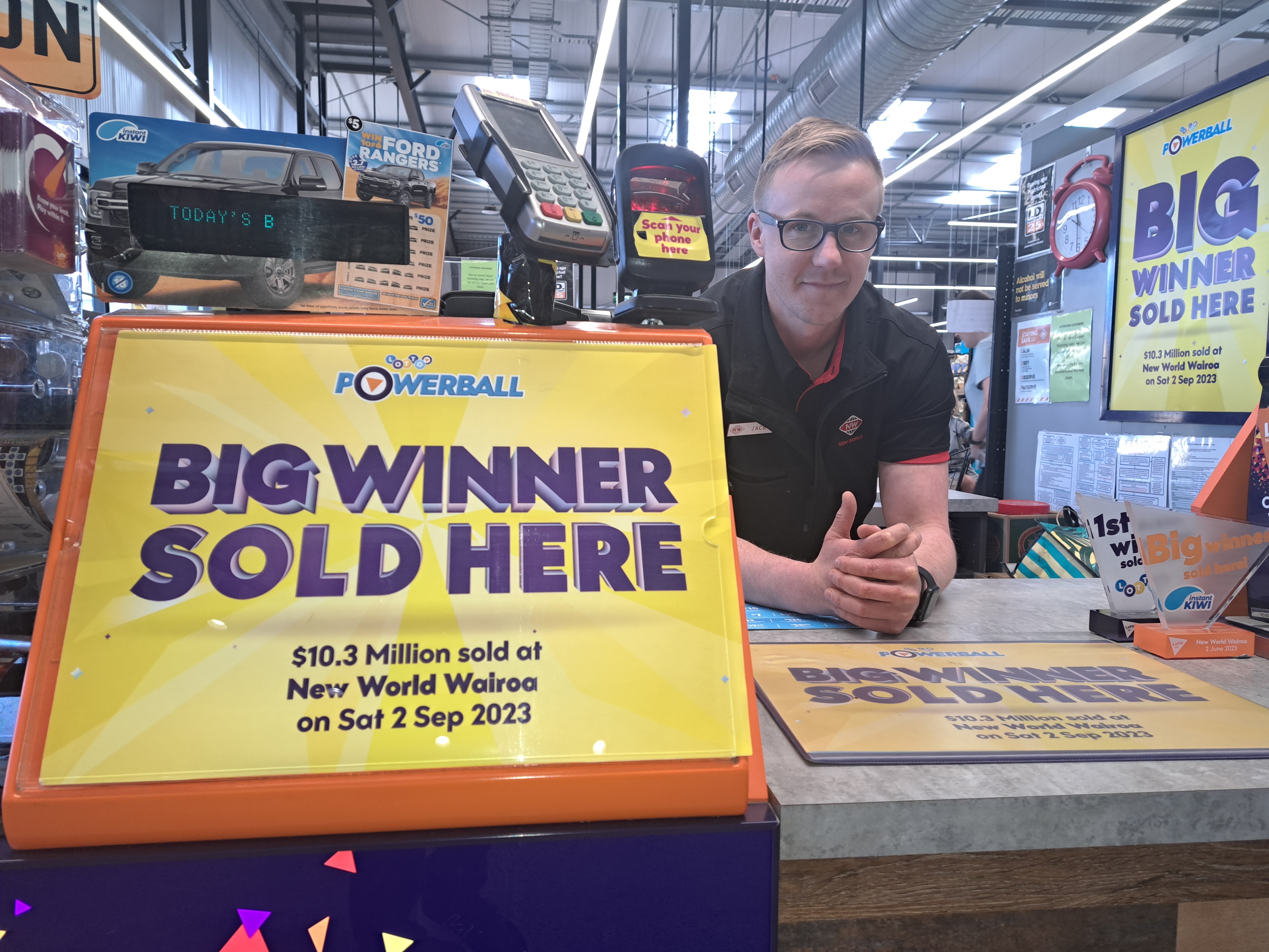 New World Wairoa owner-operator Jack Beaton in front of the terminal which printed the $10.3 million Lotto Powerball-winning ticket. Photo / Neil Reid