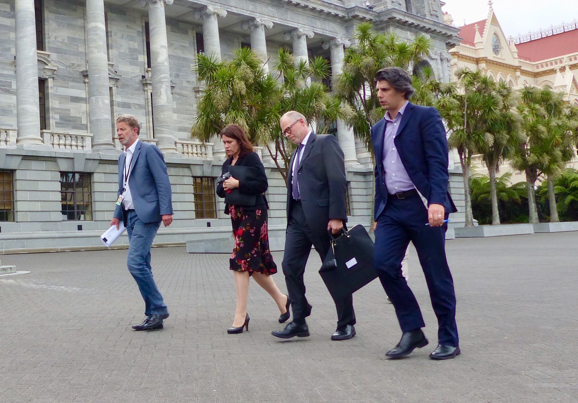 Raj Nahna, right, returning from Police HQ on March 15 with NZ First chief of staff, Jon Johansson, Civil Defence chief Sarah Stuart-Black, and DPMC chief Brook Barrington. Photo / Derek Cheng