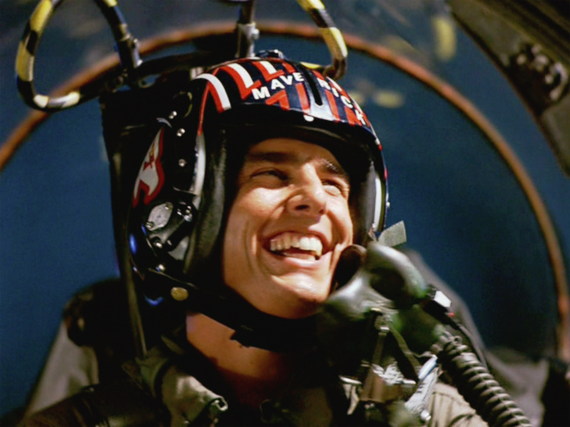 Tom Cruise all suited up on the set of Top Gun, 1986. Photo / Getty Images 