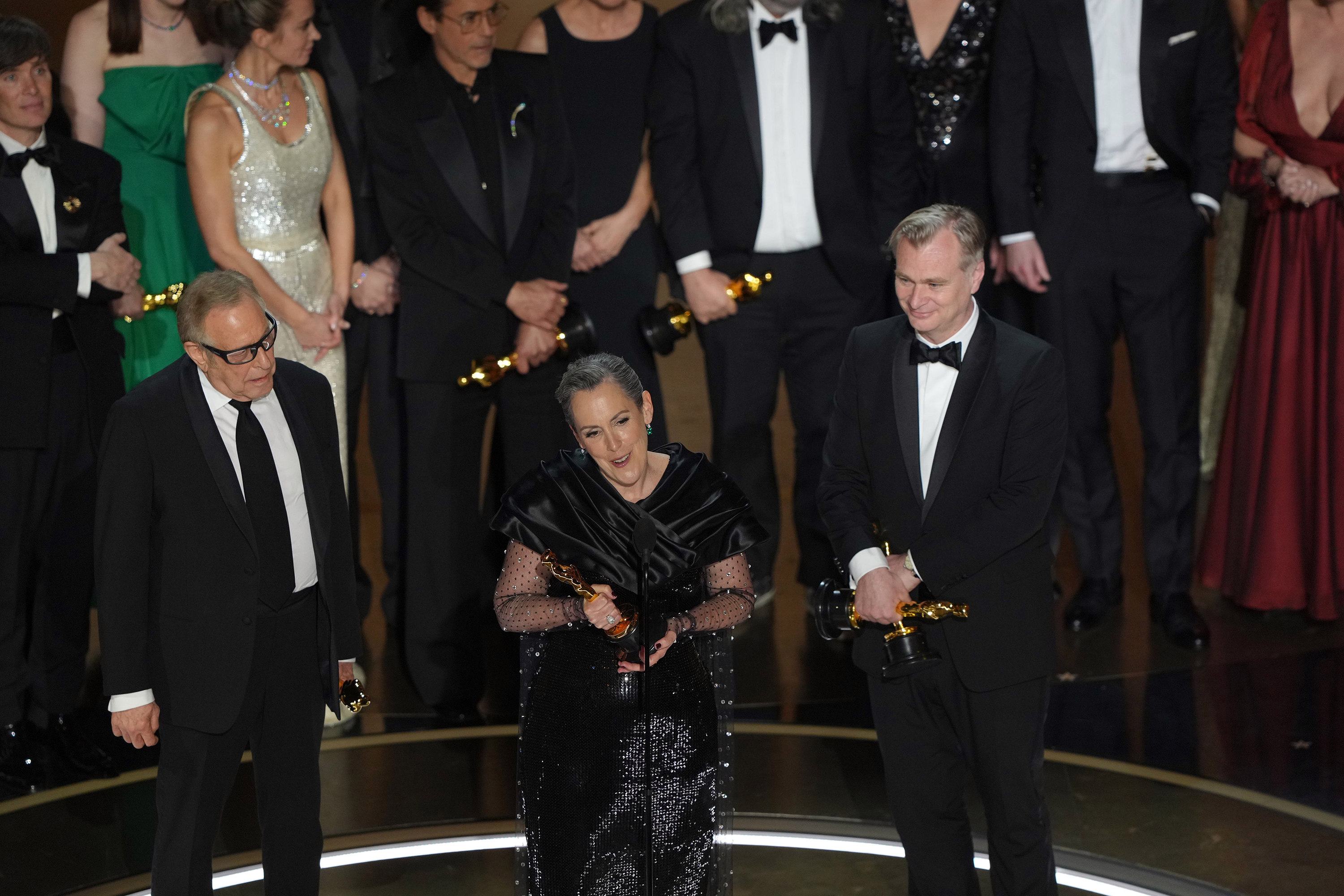 Emma Thomas, centre, one of the producers of Oppenheimer, speaking after the film won the Oscar for best picture. Photo / Amir Hamja, The New York Times