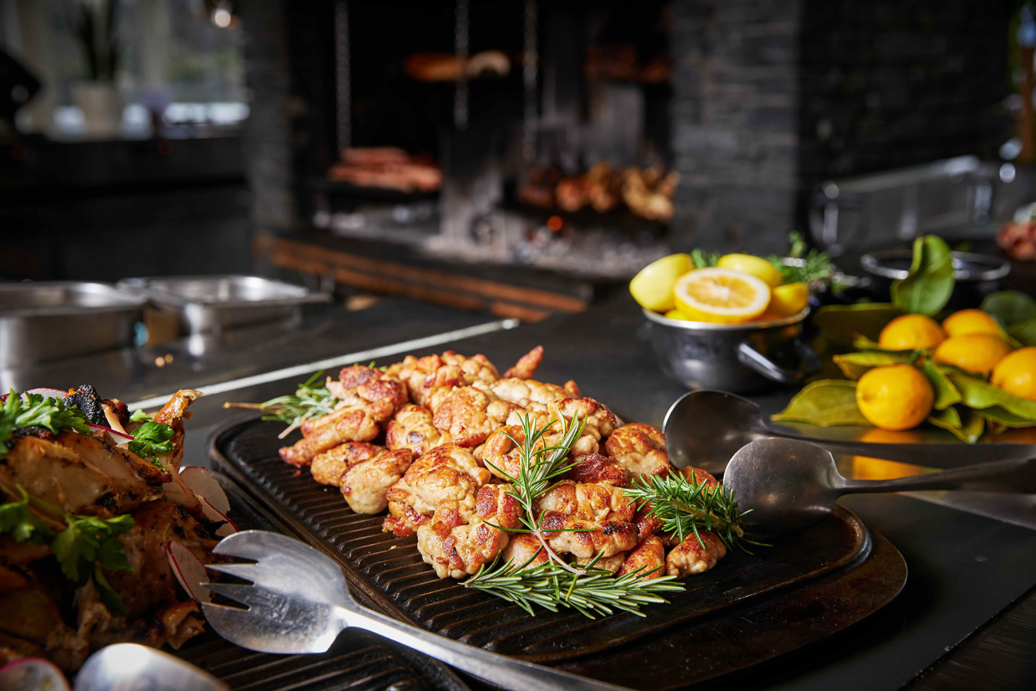 A hotplate from the buffet, garnished with rosemary. 