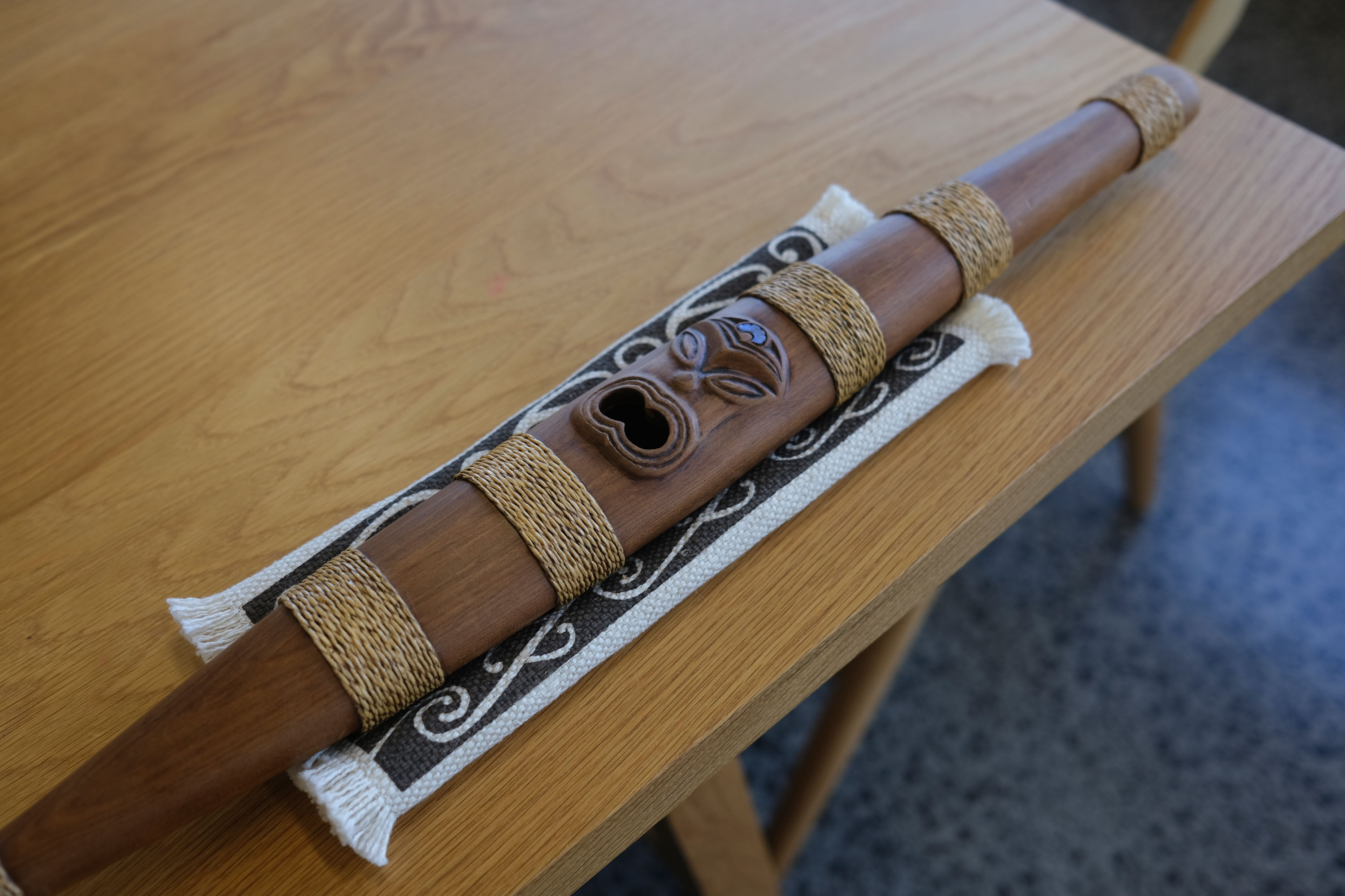 A Pūtōrino, carved from river tōtara by Thomas Carroll, is particularly special to Tyrone.