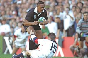 Commentator Keith Quinn almost hyperventilated when Jonah Lomu steamrolled Mike Catt. Photo / Getty Images