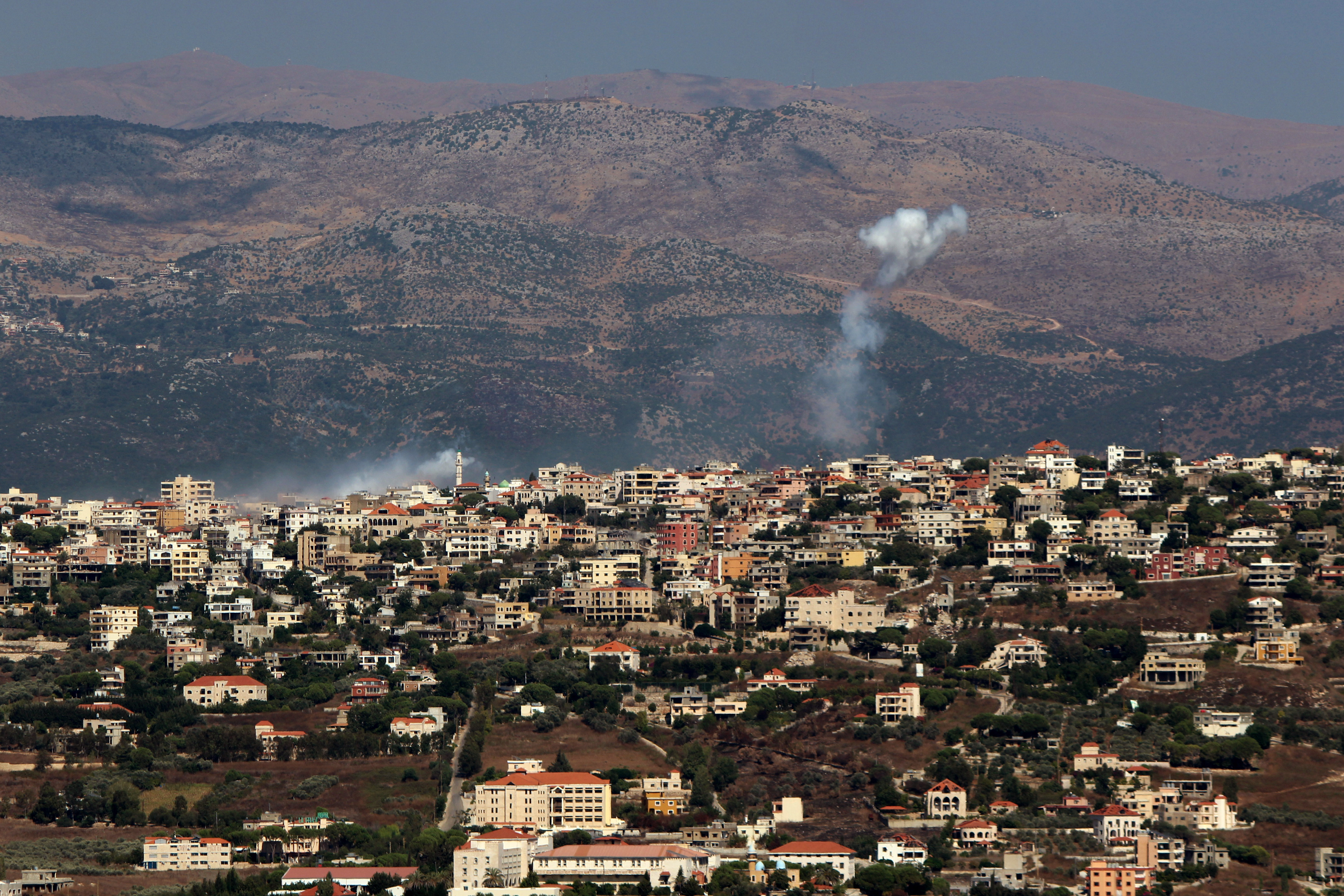 Smoke from Israeli shelling rises above the southern Lebanese village of Khiam in July. Photo / Getty Images
