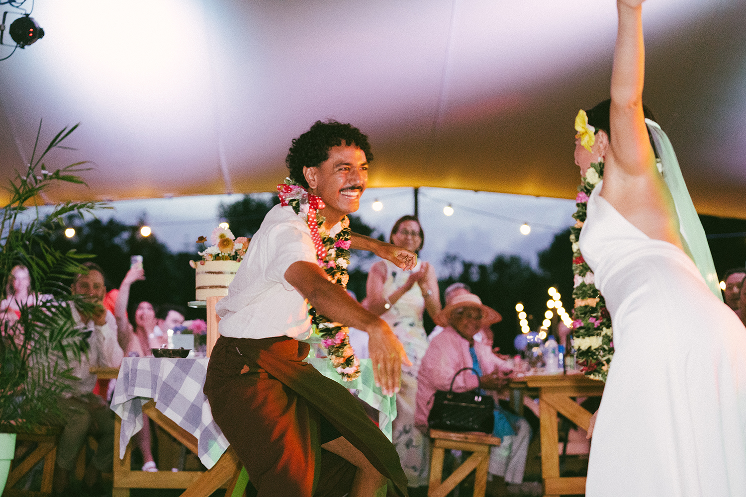 Eschewing the concept of a reception, Connor and Hayley prefer the term party to describe the celebration. Photo / Geoffery Matautia and Hele Ikimotu