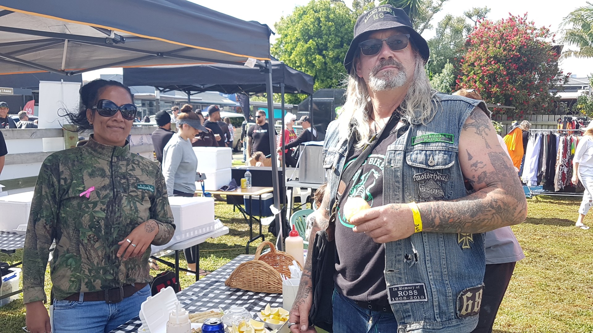Jolene Harrison, from Kareponia Marae fundraising group, was selling kai to Karl Ostomy, an Allied Biker from Waikuku, at Awanui on Saturday
