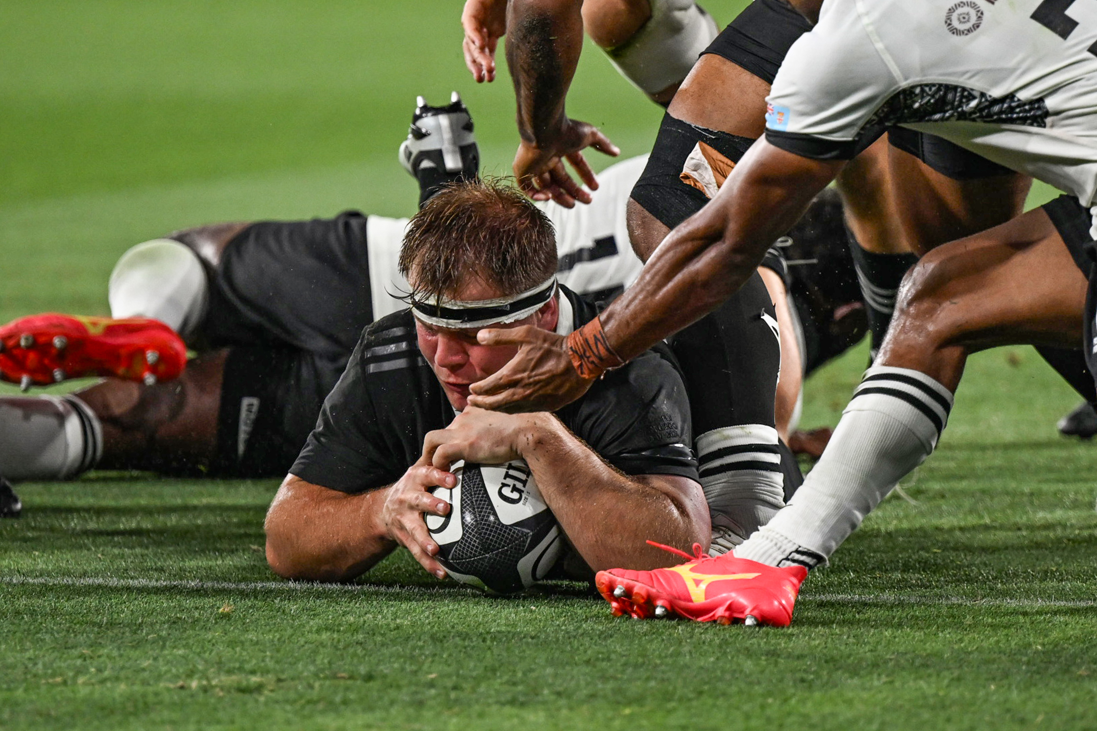 Hooker George Bell scores a try on his All Blacks debut. Photo / Photosport