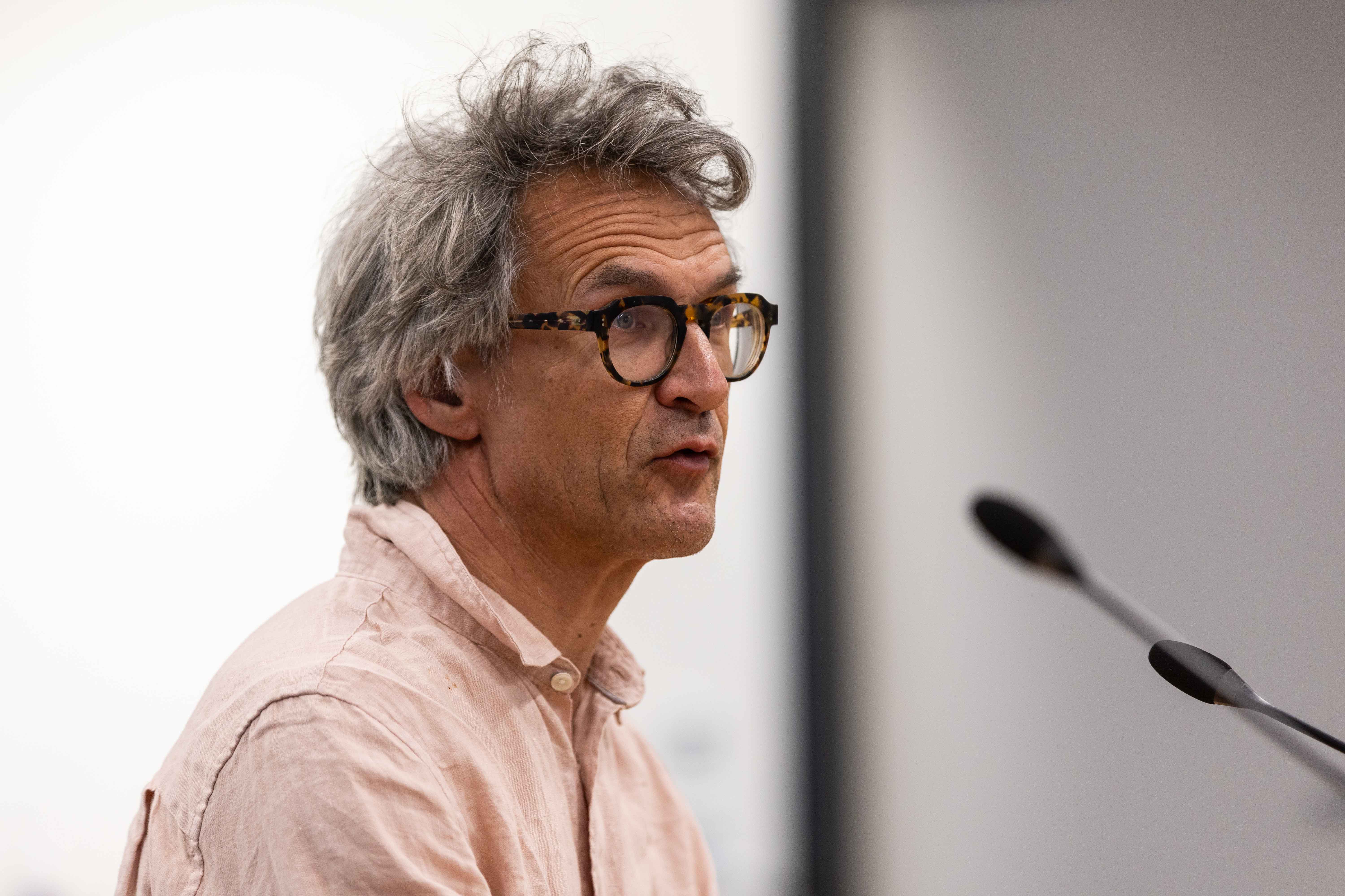 Hamish Carter, owner of Oscar & Otto, speaking in the public forum at the Tauranga City Council about the closure of The Strand waterfront carpark. Photo / Alex Cairns