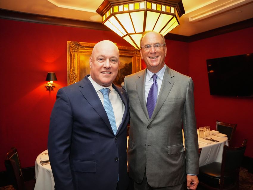 BlackRock chief executive Larry Fink (right) with Prime Minister Christopher Luxon at a Nato summit last year. Photo / Suuplied