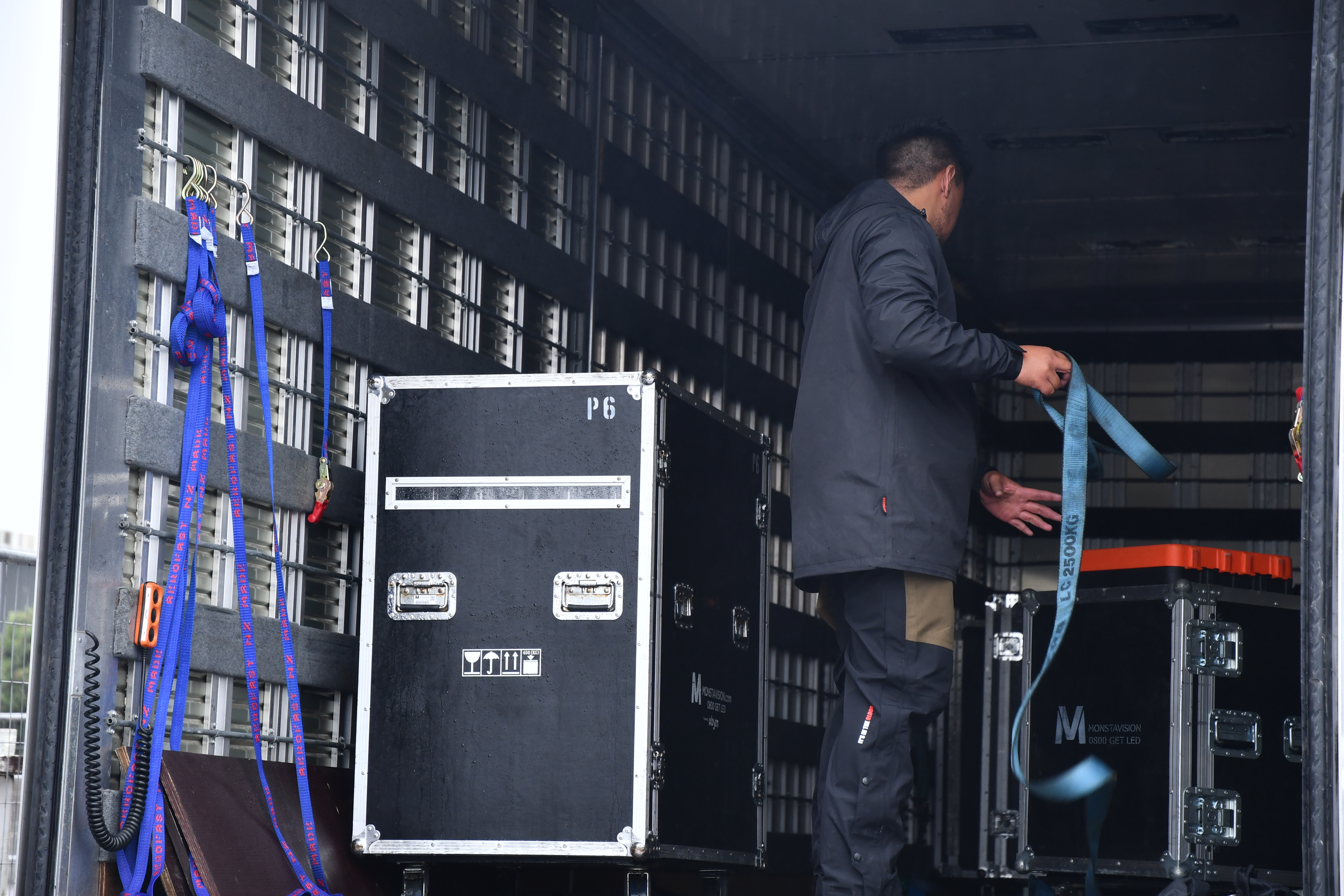 Crews spent the morning packing away the equipment that had already been set up before Juicy Fest Tauranga was called off. Photo / Laura Smith