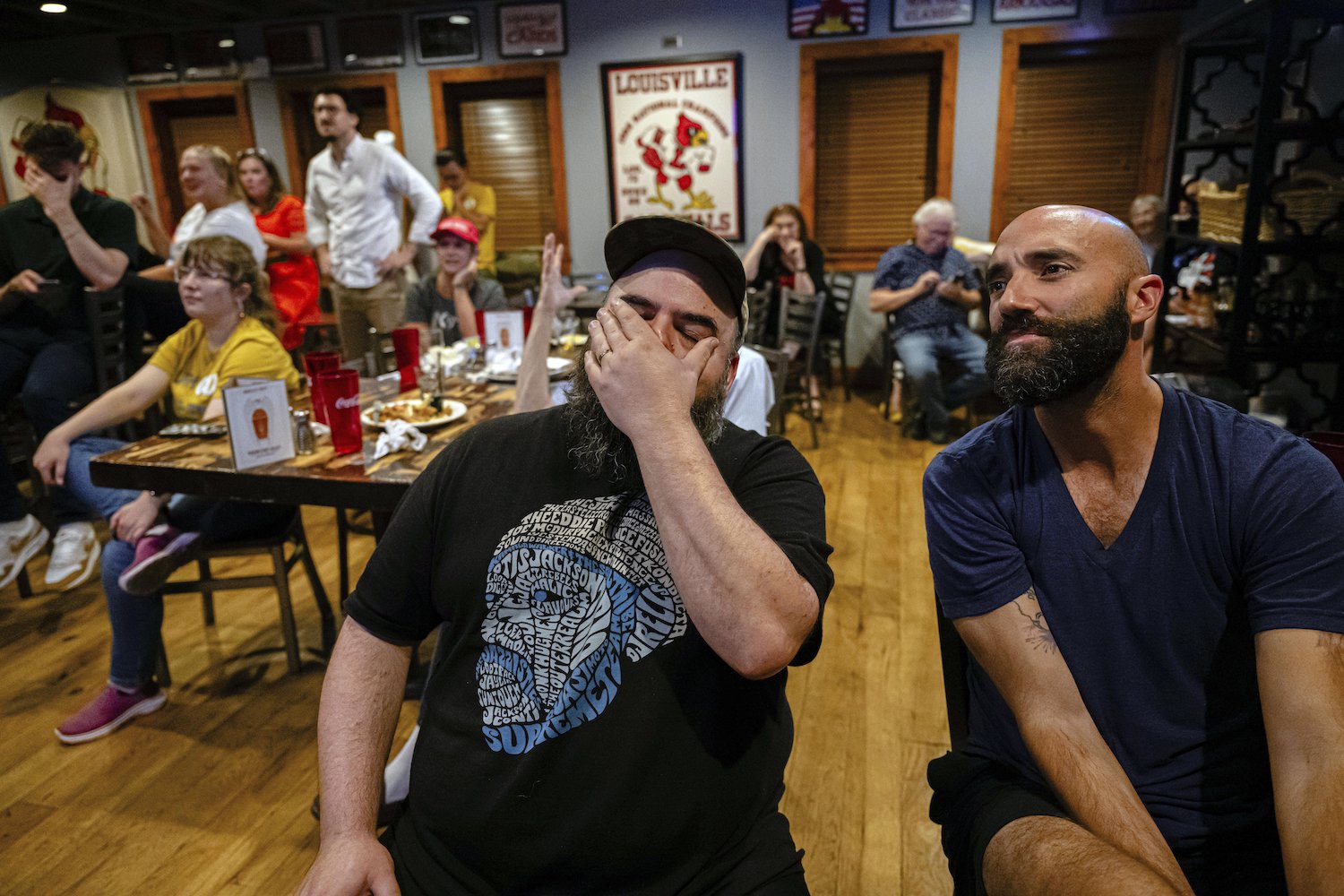 Sean Cannon, a Louisville resident, reacts during a watch party of the presidential debate between US President Joe Biden and Republican presidential candidate and former US president Donald Trump at Old Louisville Tavern. Photo / AP