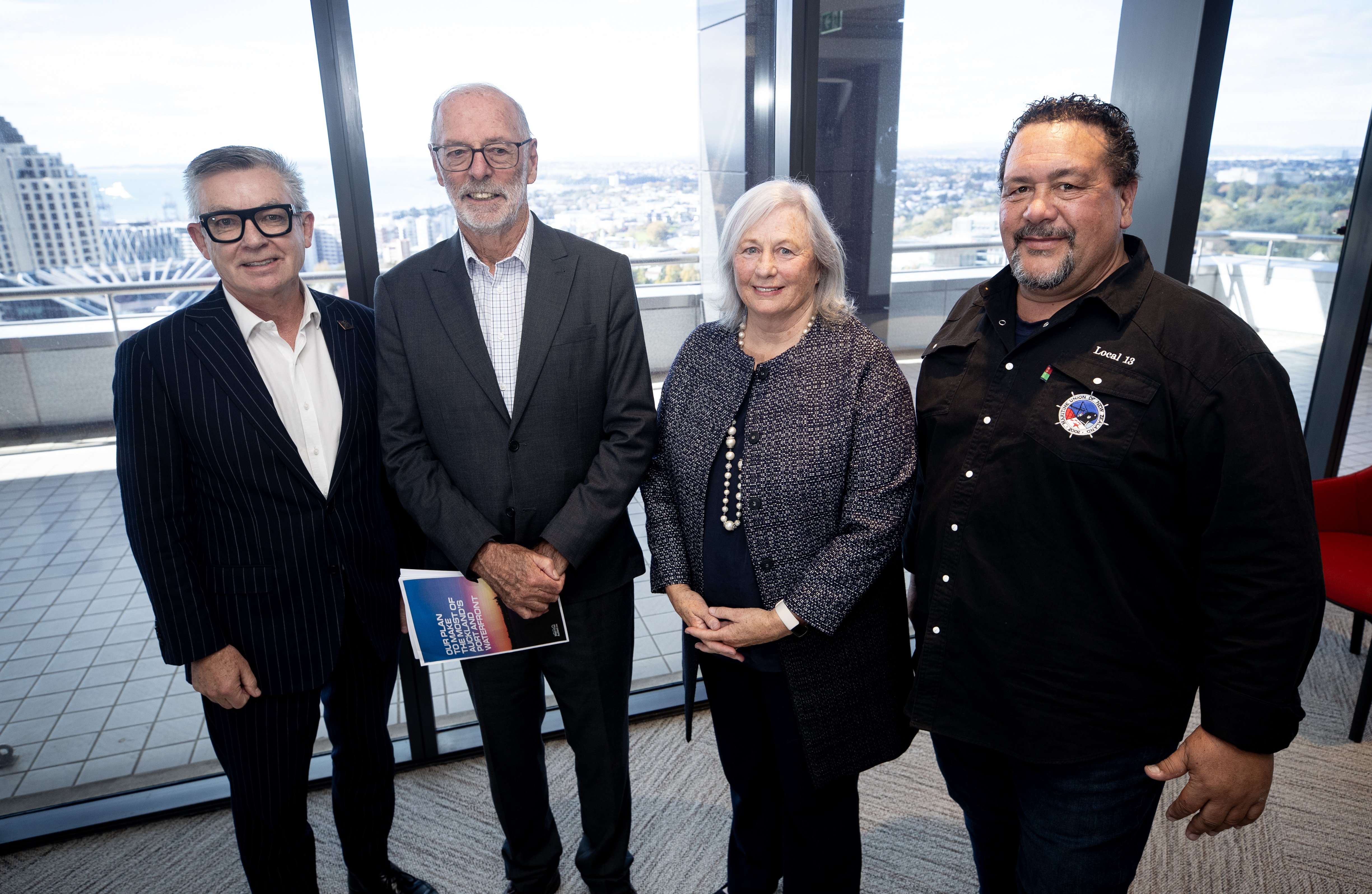 Announcing the new plan for the port: From left, Port of Auckland chief executive Roger Gray, Auckland Mayor Wayne Brown, Port chairwoman Jan Dawson and Secretary of the Maritime Union Grant Williams. Photo / Dean Purcell