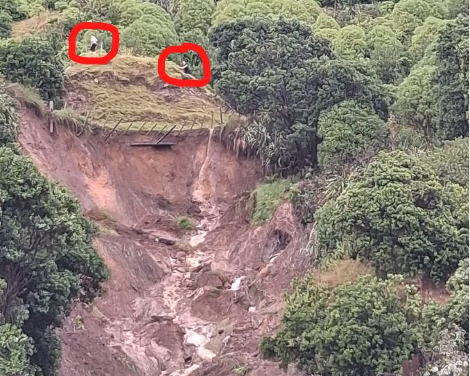 A new photo shows walkers above a Mt Maunganui slip – nearly two hours after a local called 111 to report the danger. Photo / Alister McHardy