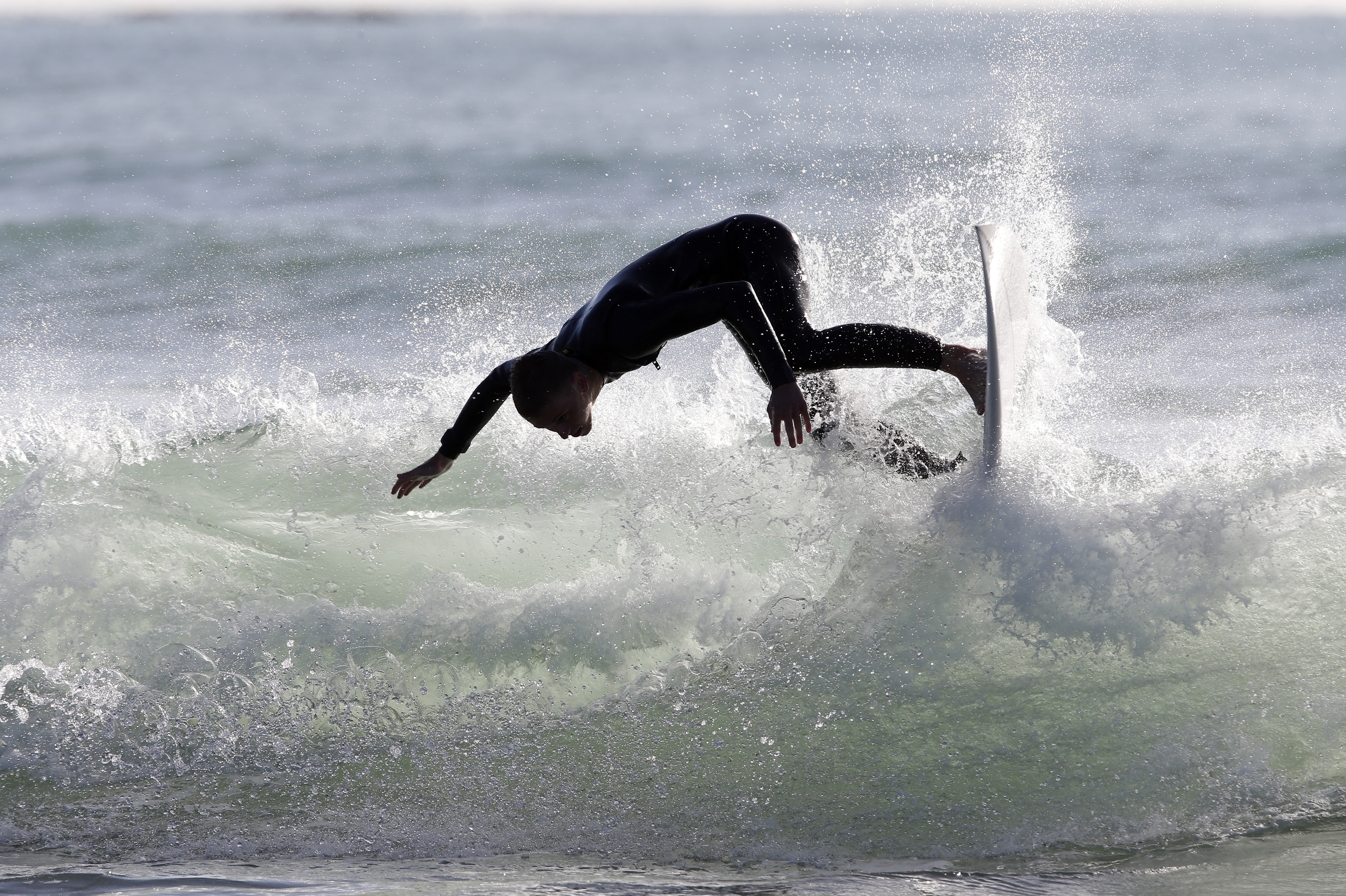 Cooper Ashill from  Whangārei Boys' High School shows the form that won him first place in the Under 18 Boys section at the Northland Scholastic Surf trials. Photo / Michael Cunningham