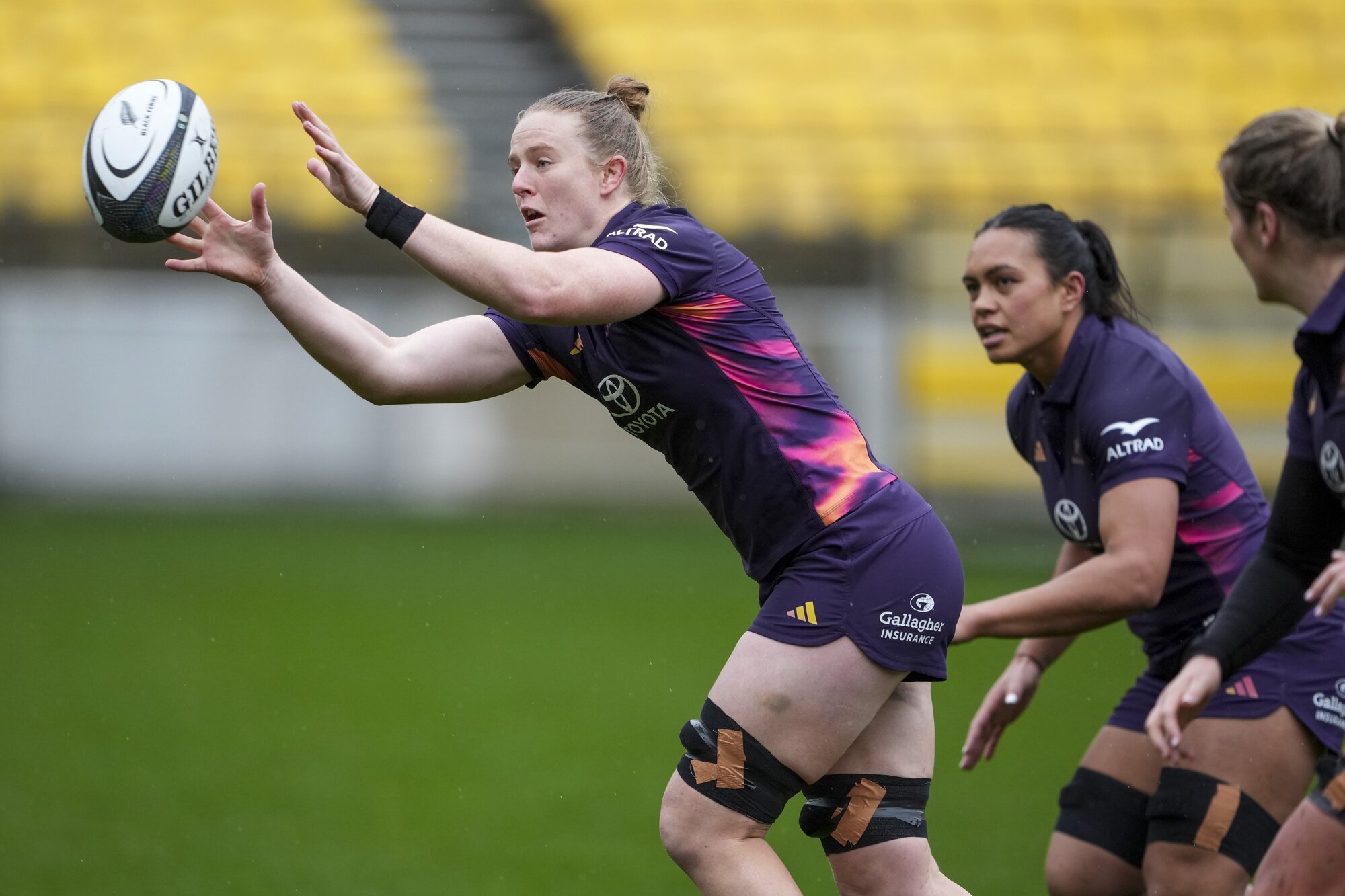 Laura Bayfield links up in a Black Ferns captains run before their test against Australia. Photo / Getty Images