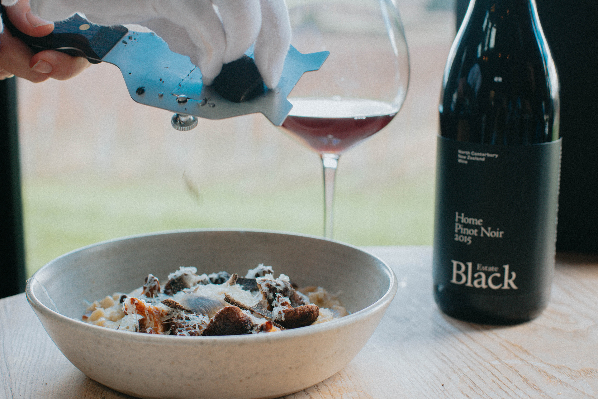 Black Estate's lunchtime restaurant looks across rows of vines to the foothills of the Southern Alps. Photo / Supplied