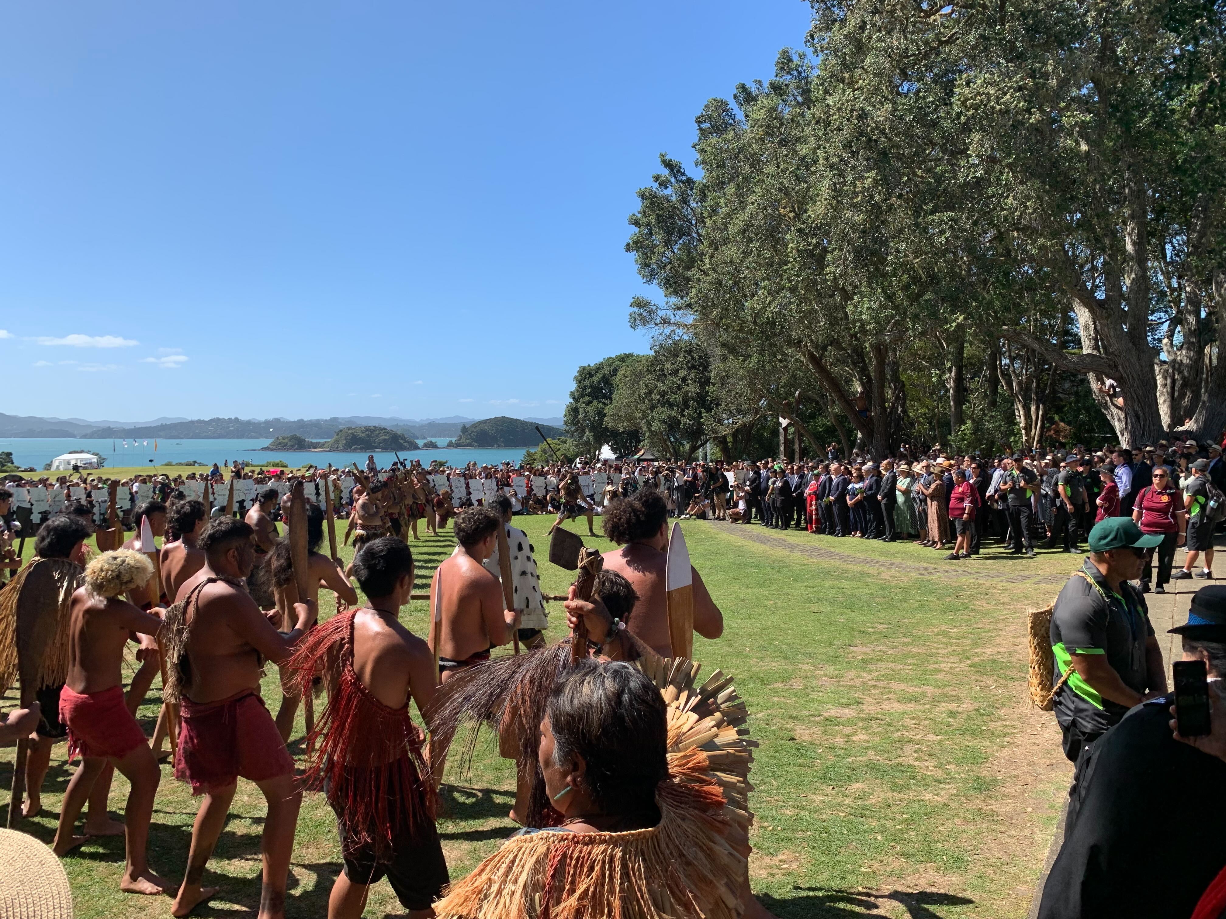 Christopher Luxon, David Seymour, Winston Peters and Cabinet ministers were greeted with a pōwhiri at Te Whare Rūnanga, the Waitangi Treaty Grounds. Photo / Adam Pearse