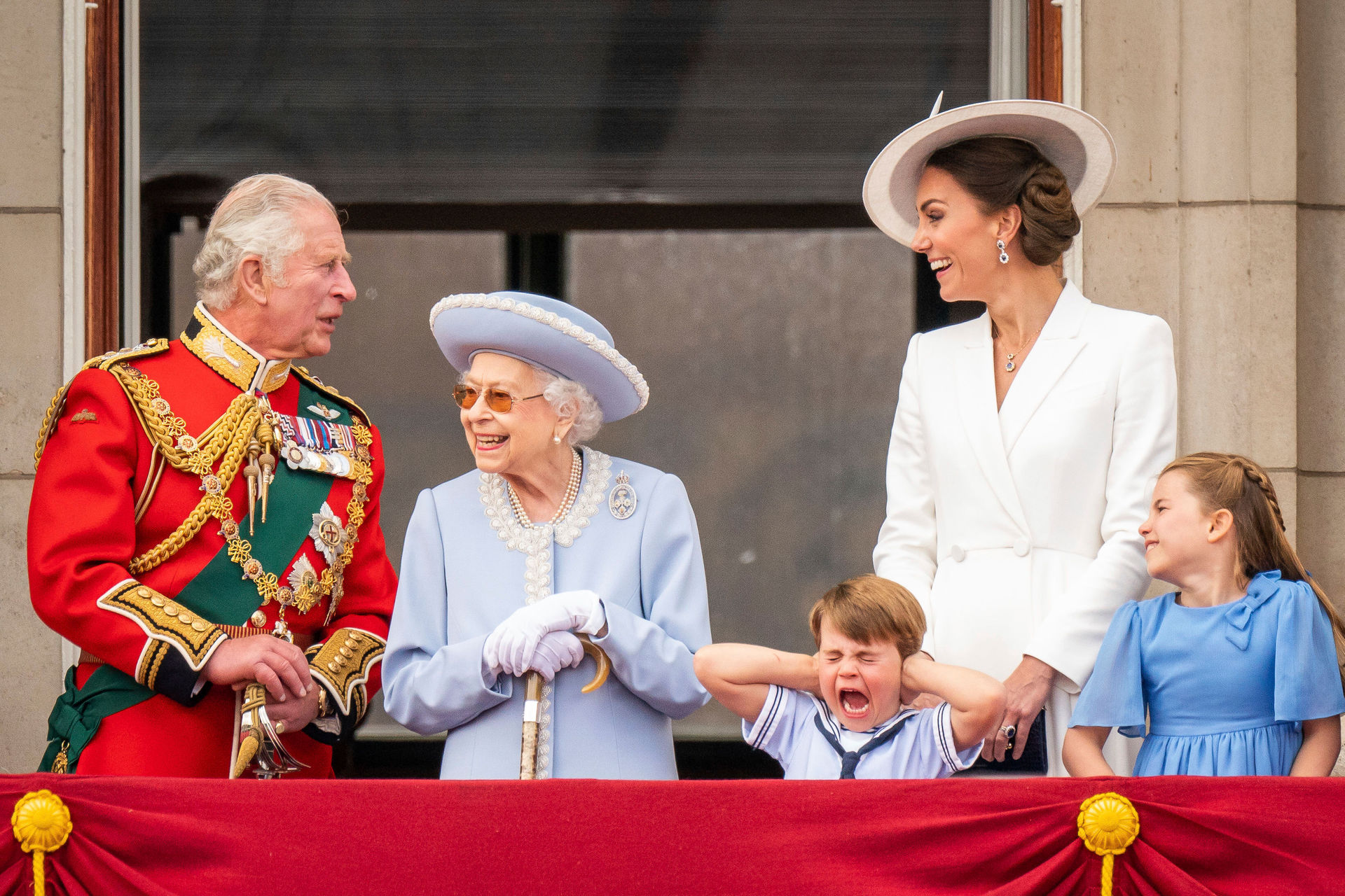 Britain's Prince Charles, Queen Elizabeth II, Prince Louis, Kate, Duchess of Cambridge and Princess Charlotte stand on the balcony of Buckingham Palace. Photo / AP