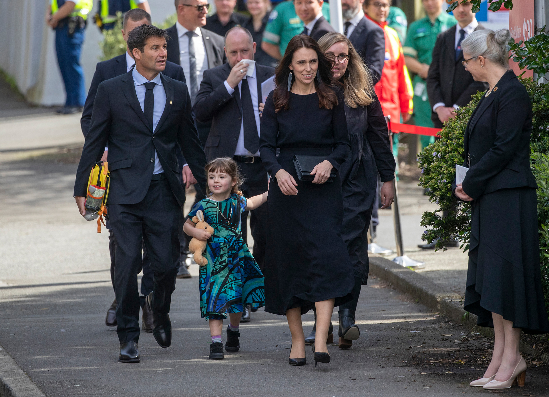 Jacinda Ardern and Clarke Gayford are parents to daughter Neve Gayford, pictured as the family walk to a memorial event for Queen Elizabeth in 2022. Neve was born eight months after her mum became Prime Minister. File photo / Mark Mitchell