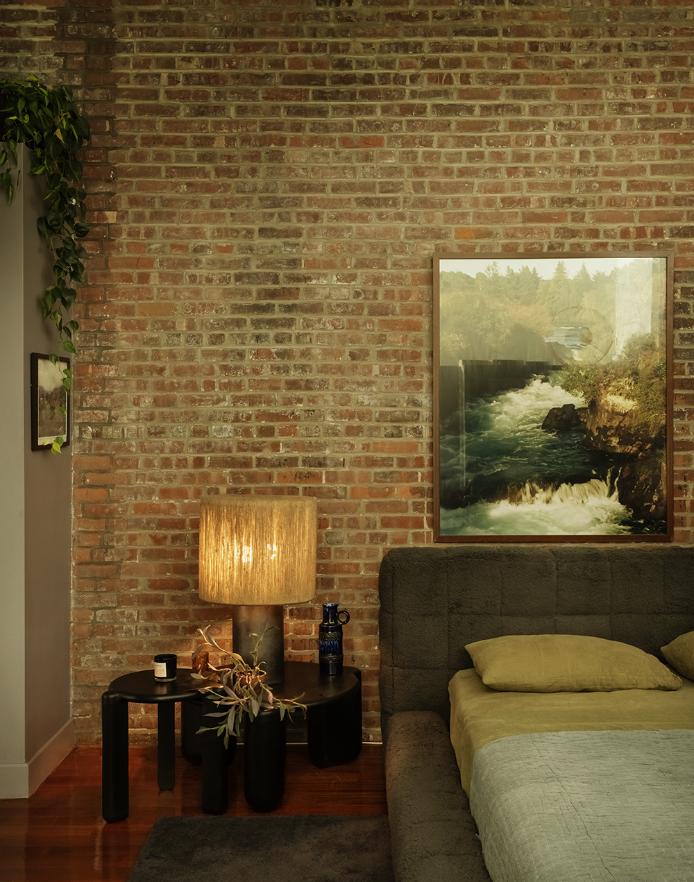 An atmospheric Huka Falls print hangs in their bedroom. Photo / Matthew Williams