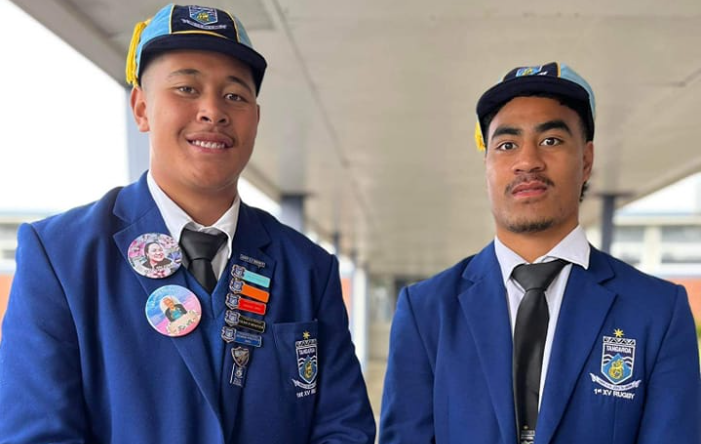 Tangaroa College's Mikaele Ta'avao, left, and Sefuluai Vaimauga were presented with their first XV rugby caps before starring in a win over Auckland Grammar. Photo / Tangaroa College Sport/Facebook