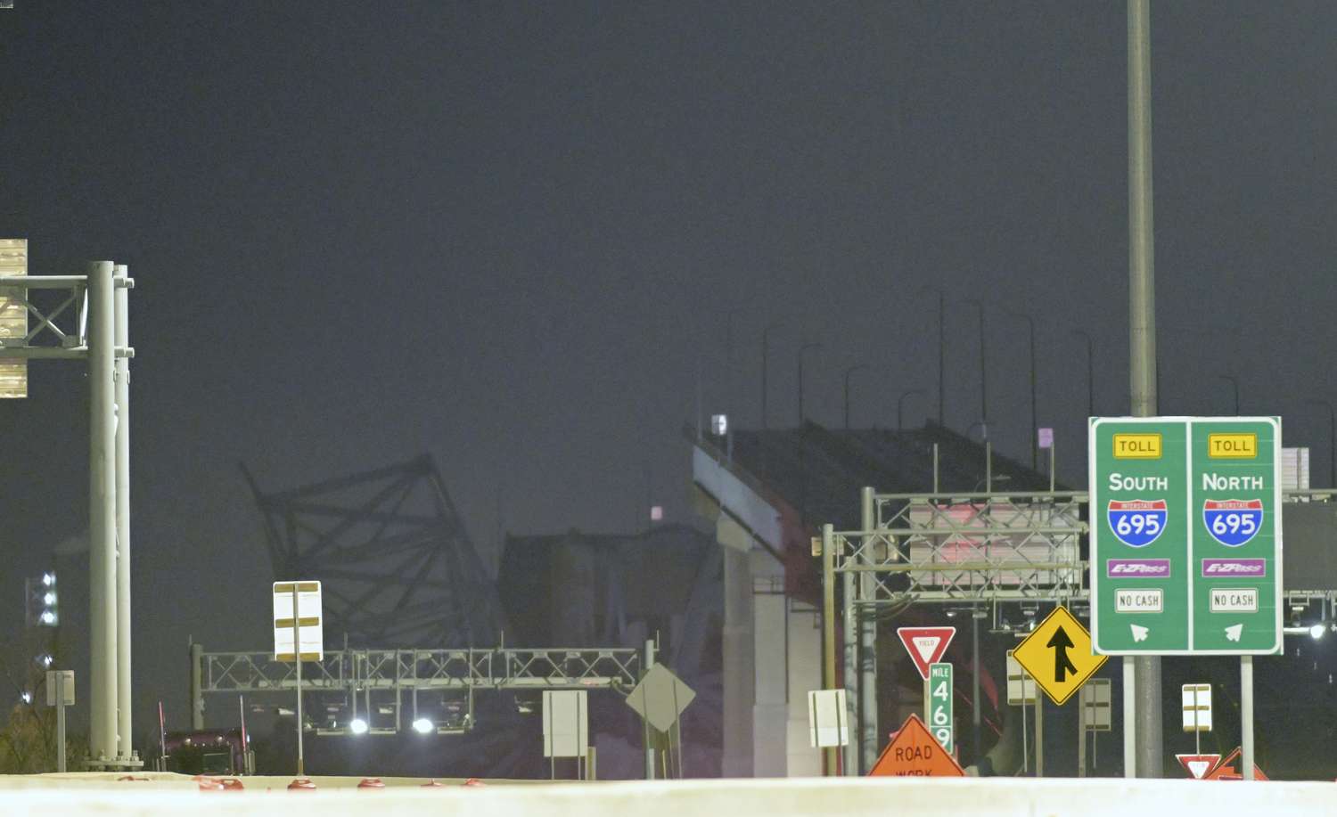 Parts of the Francis Scott Key Bridge remain after a container ship collided with a support in Baltimore. Photo / AP