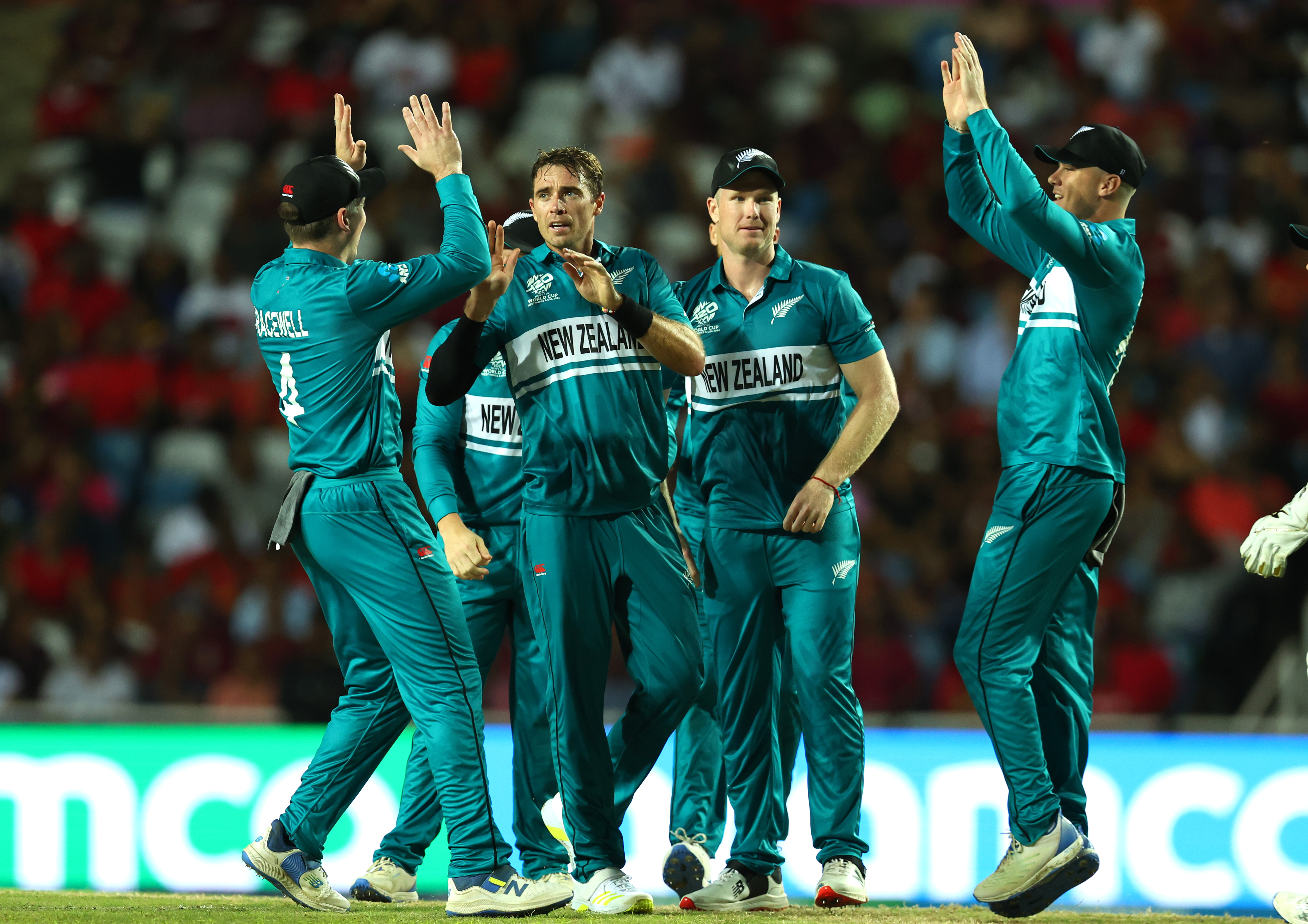 The Black Caps celebrate the wicket of West Indies captain Rovman Powell. Photo / Getty Images