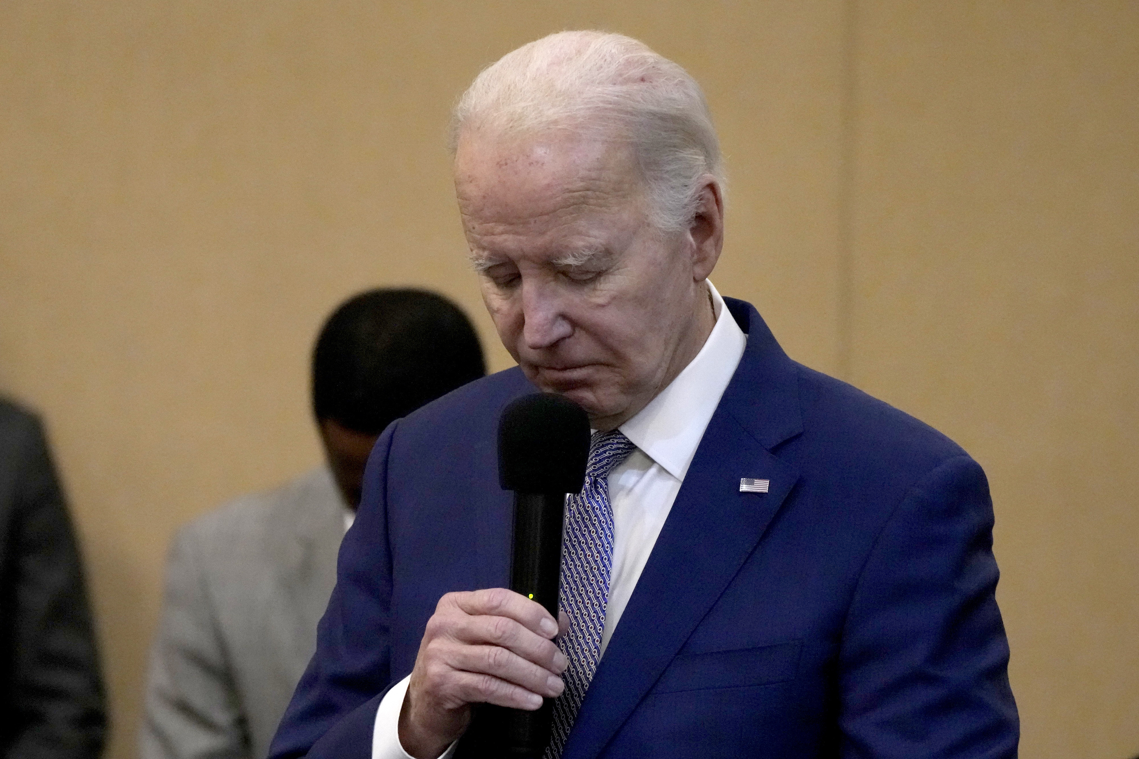 President Biden bows his head in a moment of silence for the three American troops killed in a drone strike in northeast Jordan. Photo / AP