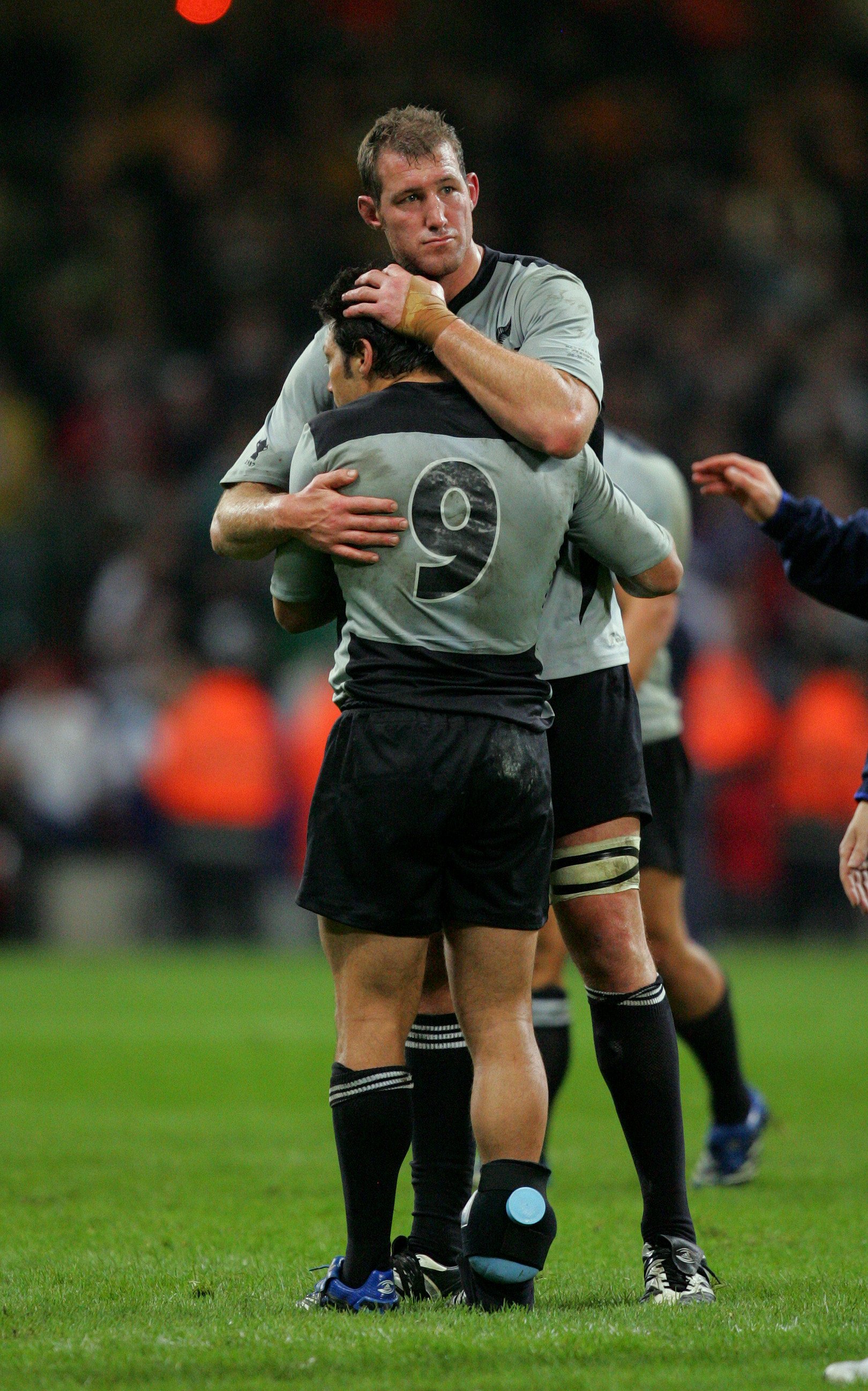 All Blacks Chris Jack and Byron Kelleher embrace after the loss in the 2007 Rugby World Cup to France. Photo / Brett Phibbs
