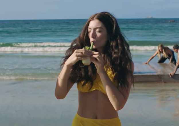 Amid lots of laughs, Lorde admitted she was smoking a bong of sorts in the music video - a fennel bulb. Photo / via video