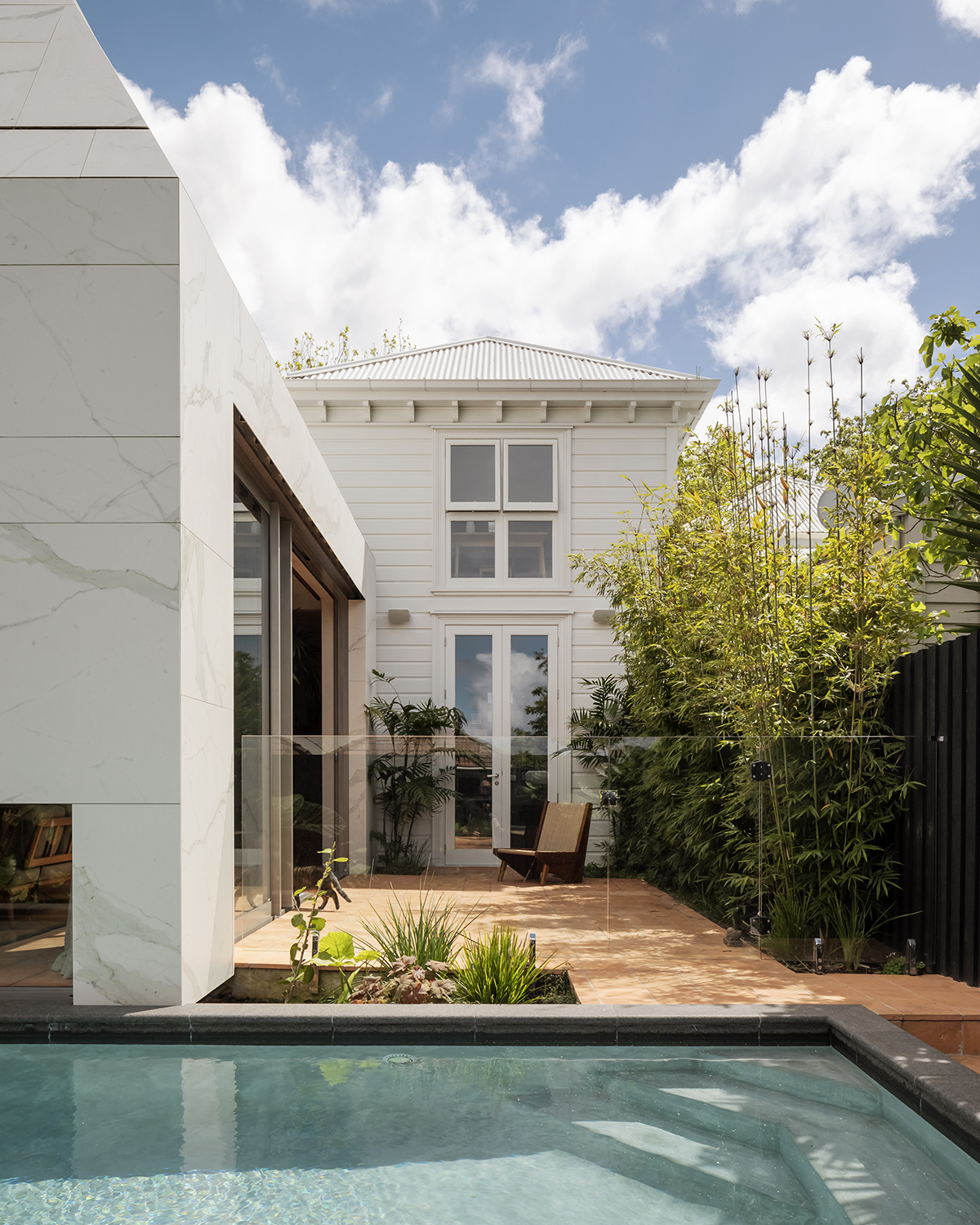 The sculptural, white-tiled addition at the back of the villa. Photo / Supplied